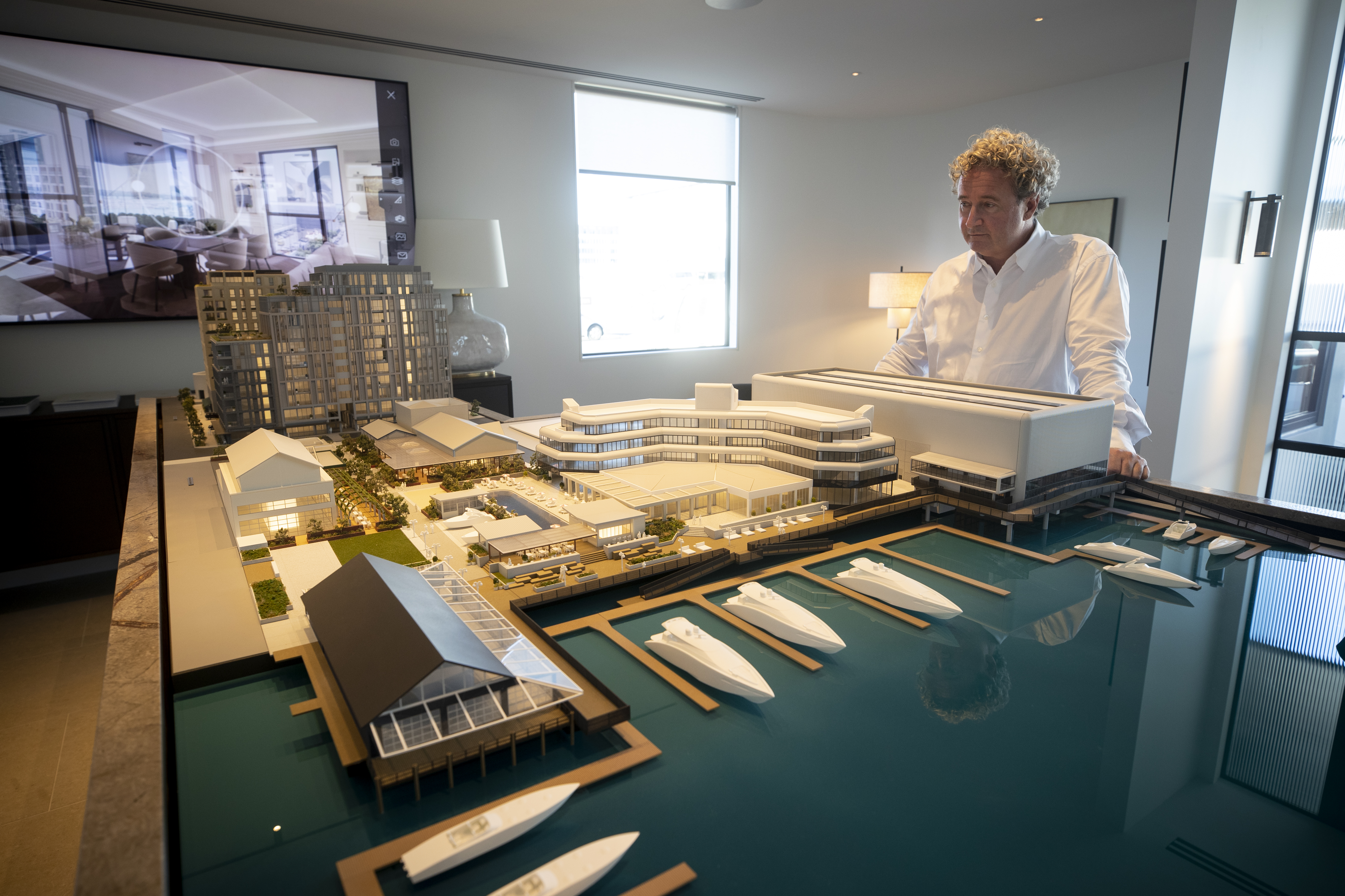 Chris Meehan with Winton's $750m Wynyard Quarter plans; pier21 Drystack is to the far right. Photo / Dean Purcell