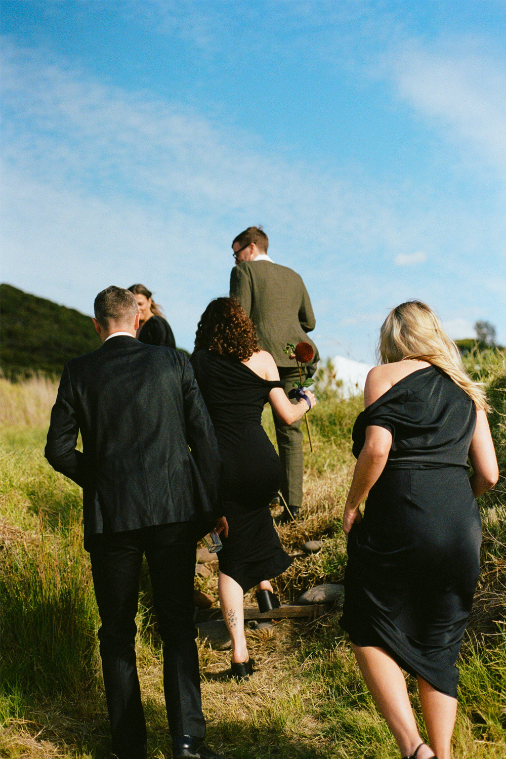Hair and make-up were executed by Cam's bridesmaid and niece Ellie Deynzer. Photo / Poet Pictures