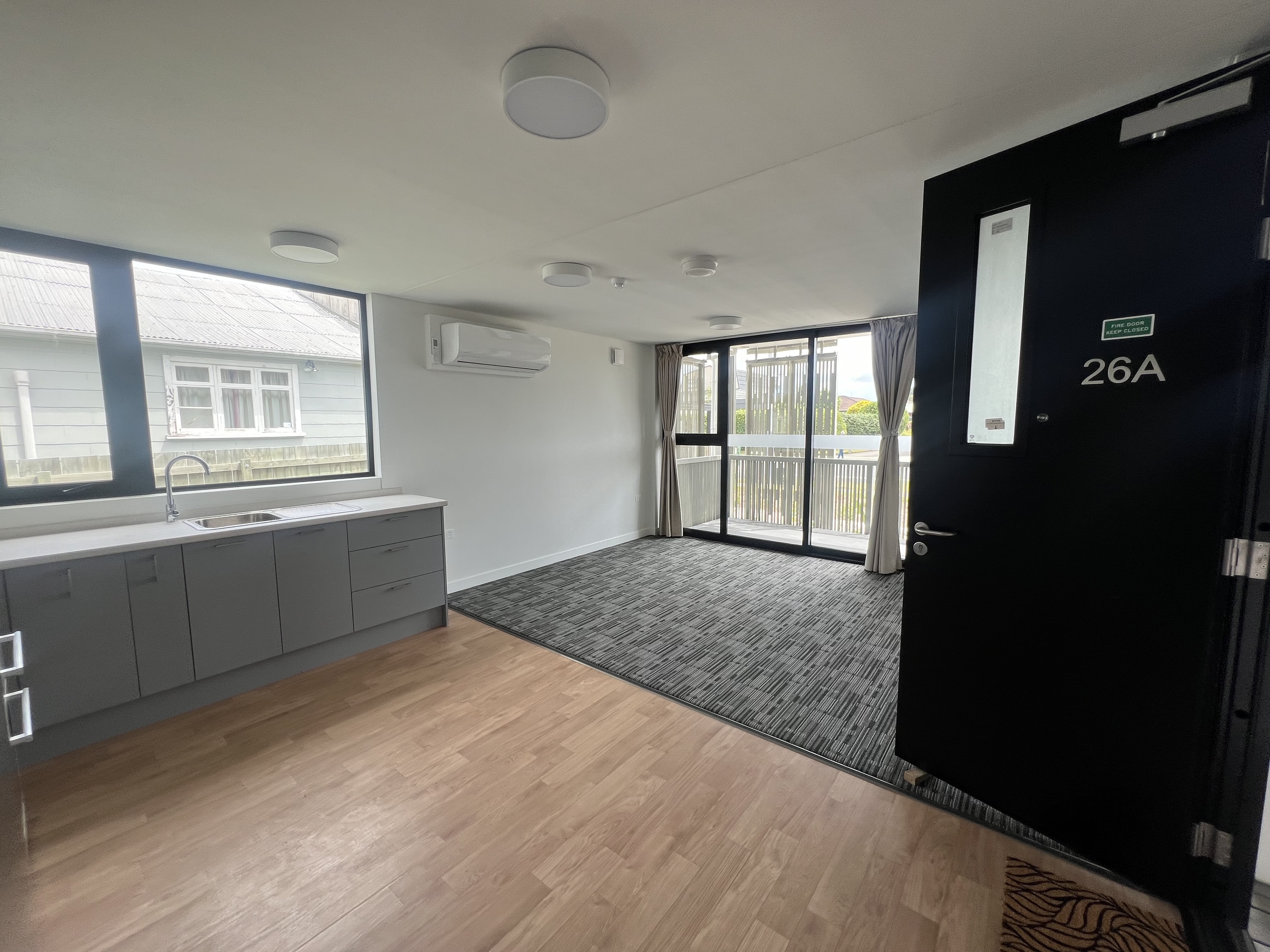 The lounge area of one of the new Kāinga Ora apartments on the corner of Malfroy Rd and Ranolf St. Photo / Kelly Makiha