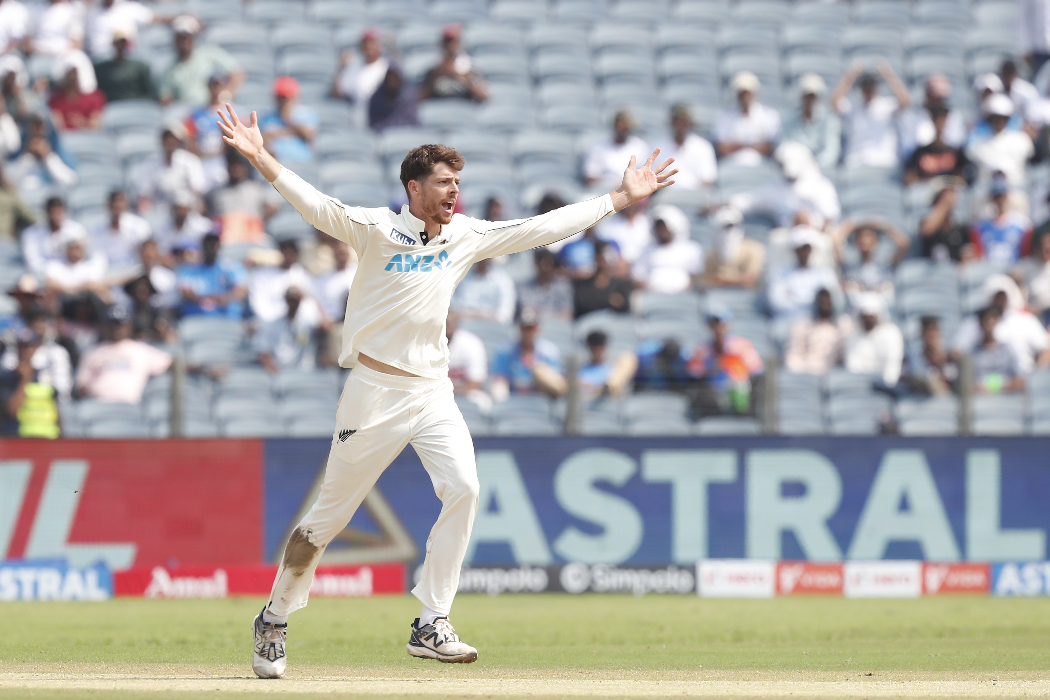 Mitchell Santner celebrates the wicket of Ravichandran Ashwin. Photo / Photosport