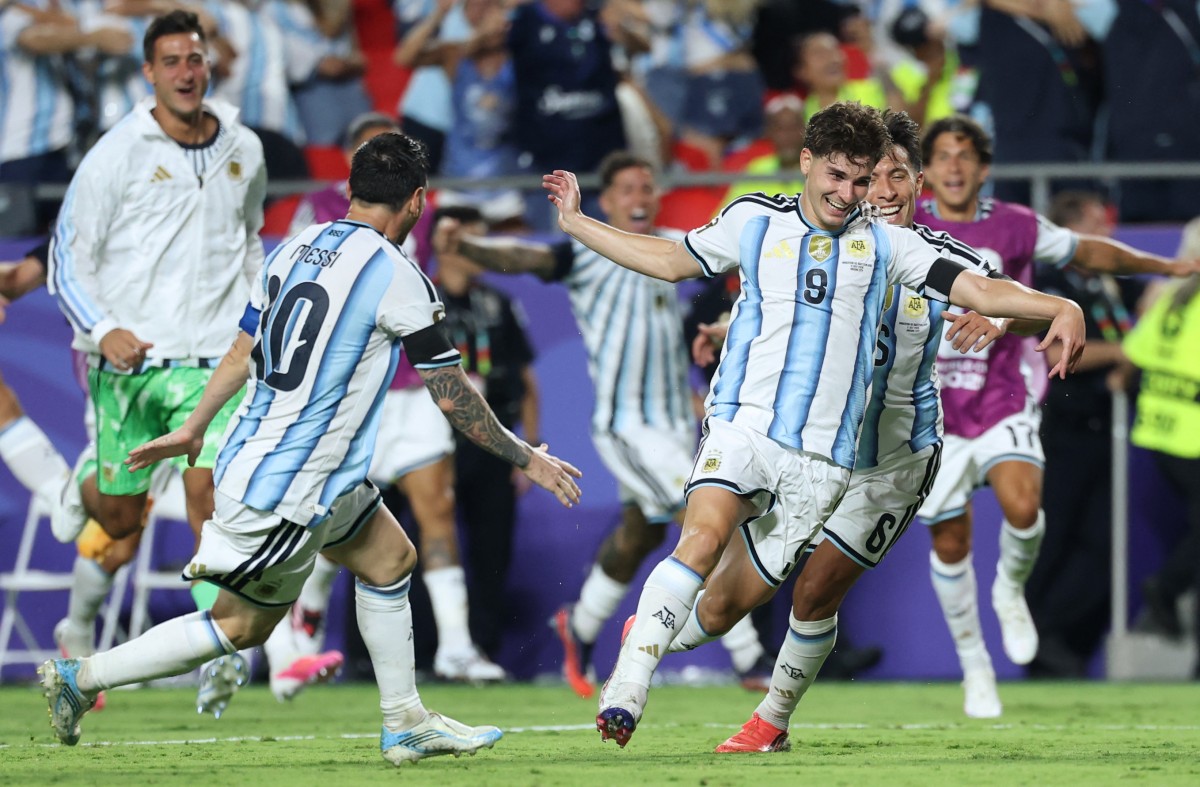 Argentina celebrate Julian Alvarez's goal against Switzerland. Photo / Thomas Coex, AFP