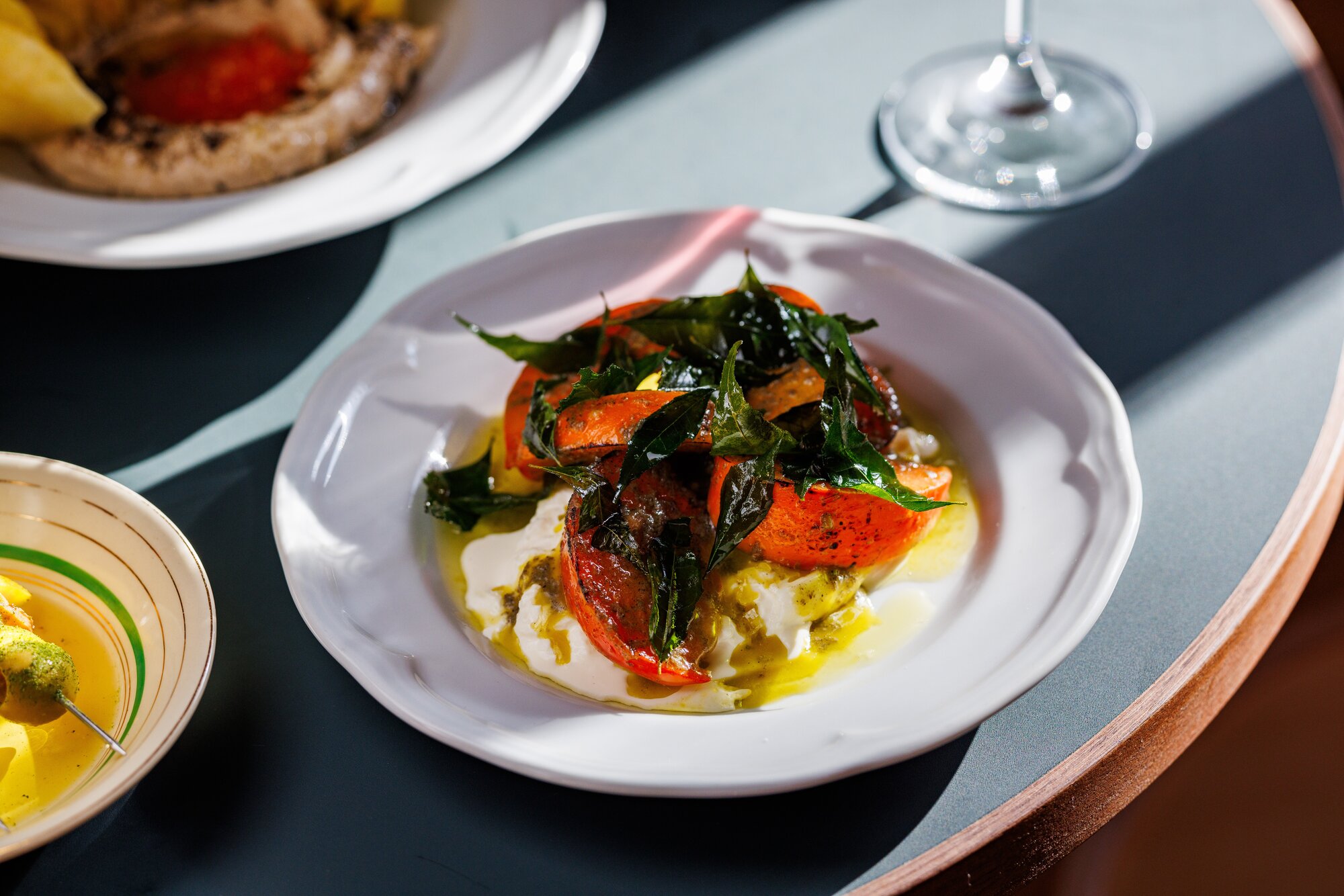 When it works, it works: the burrata with persimmon. Photo / Babiche Martens