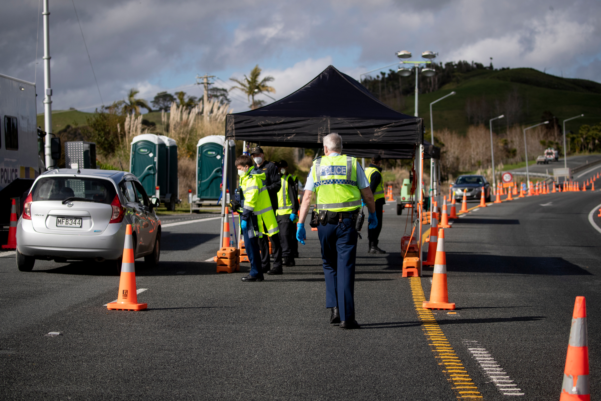Police and military personnel at the 2021 border between Auckland and Northland. Photo / Dean Purcell