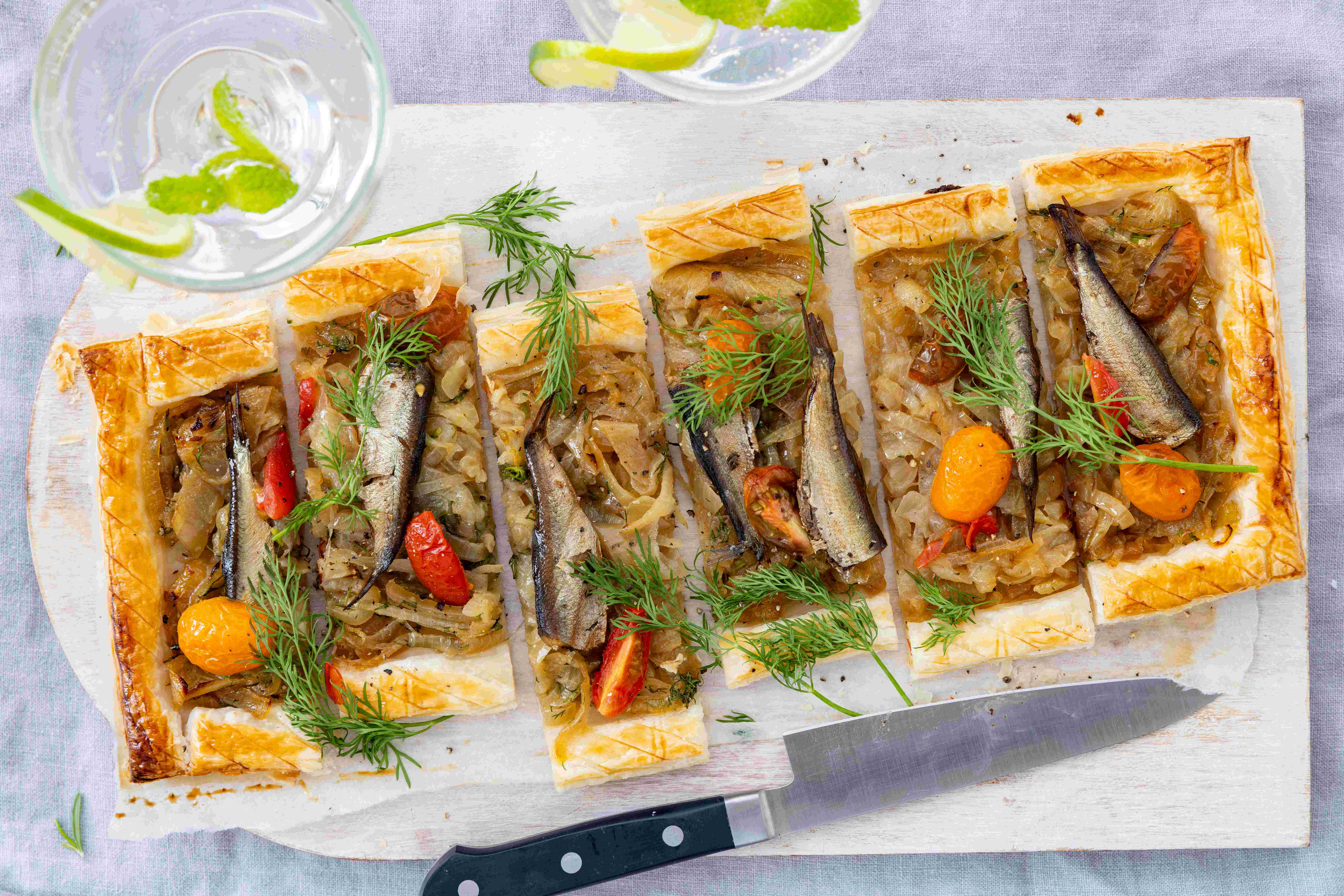Enjoy the depth of caramelised onions and the smoky flavour of sardines in this easy tart recipe. Photo / Babiche Martens