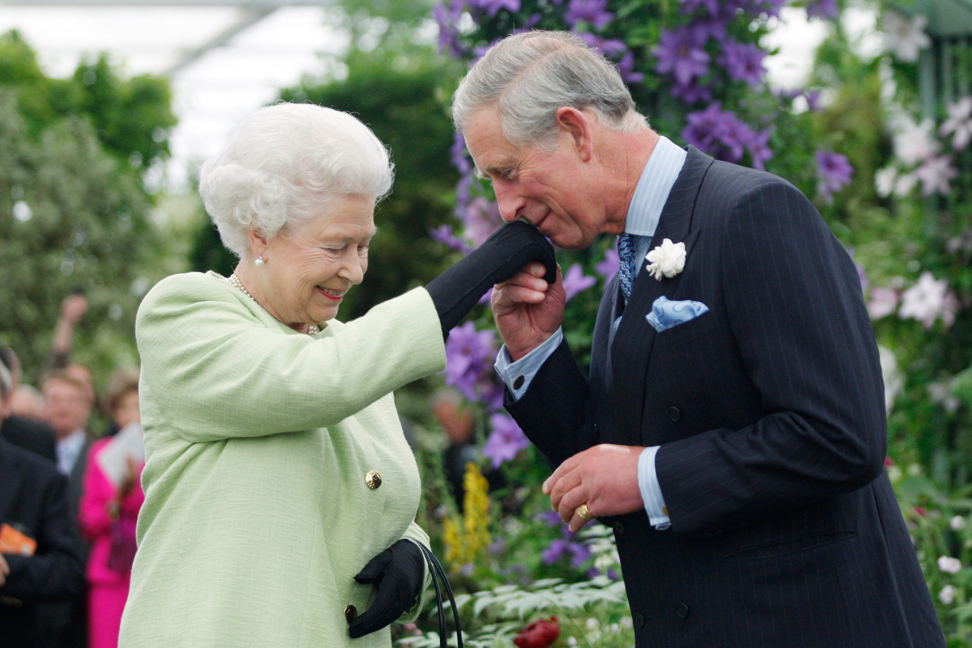 Queen Elizabeth II presents Prince Charles, Prince of Wales with the Royal Horticultural Society's Victoria Medal of Honour. Photo / Getty