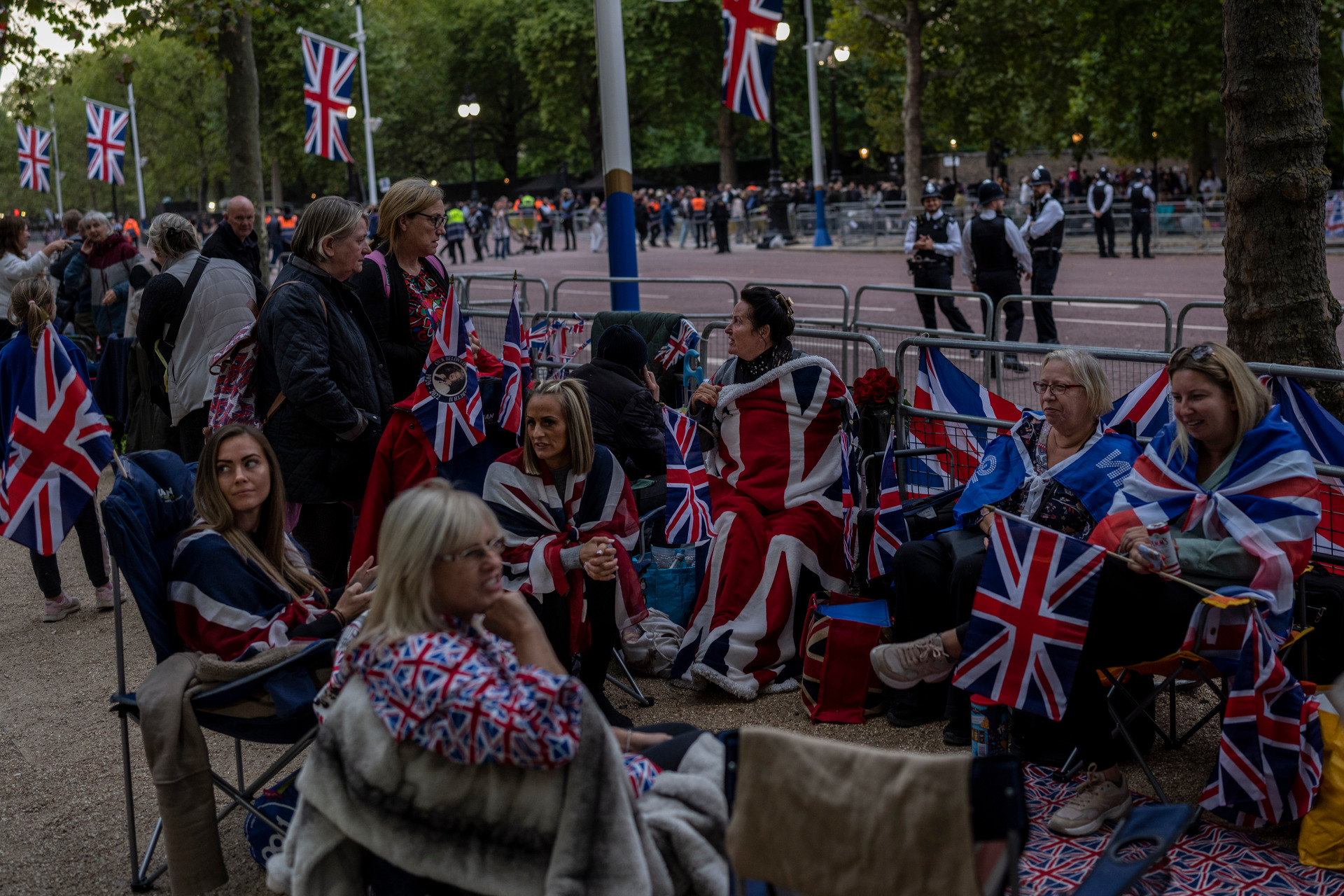 People camp out on The Mall on the eve of the funeral of Queen Elizabeth II in London. Photo / AP