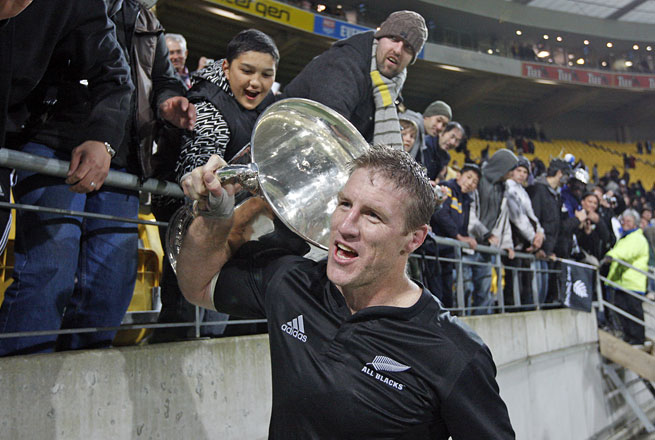 Brad Thorn celebrates with the Bledisloe Cup after the 33-6 win over the Wallabies in Wellington in 2009. Photo / Mark Mitchell
