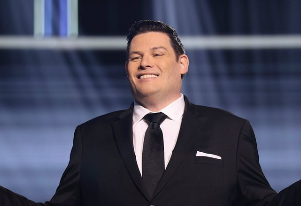 One of the Chase's quiz masters has revealed the motivation behind his weight loss. Photo / @markthebeastlabbett