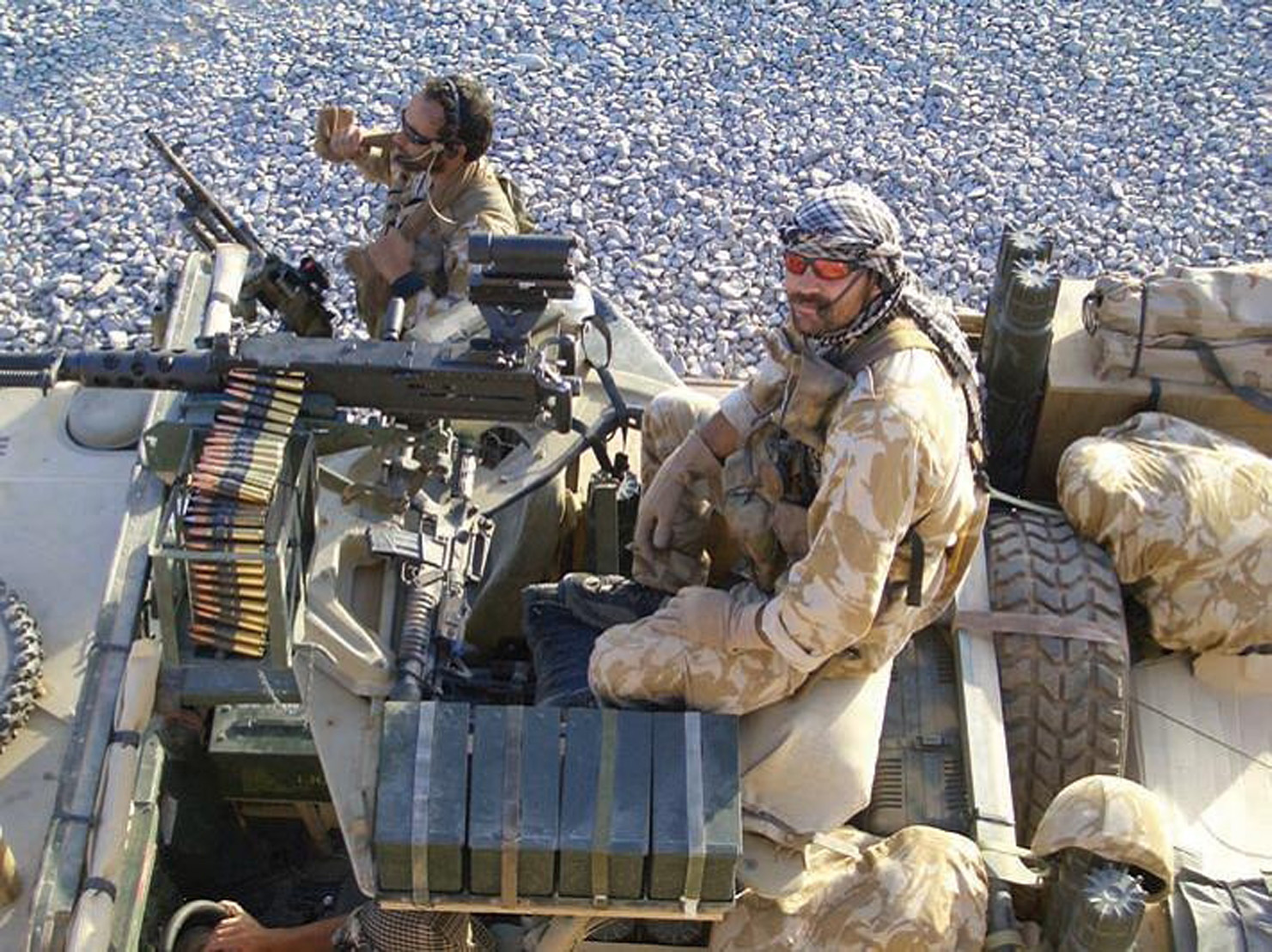 Photos of the NZ SAS unit members - including Willie Apiata (seen in this file photo), Jamie Pennell and an injured Steve Askin - were snapped at the scene of the raid by a foreign photographer. Photo / Supplied