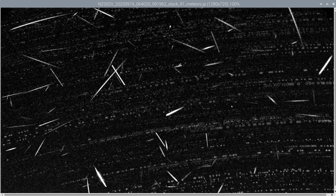 Footage from Brendon Reid's camera in Northland.  The lighter dots in the background are stars moving across the field of view of the camera and the brighter streaks are meteorites burning up.