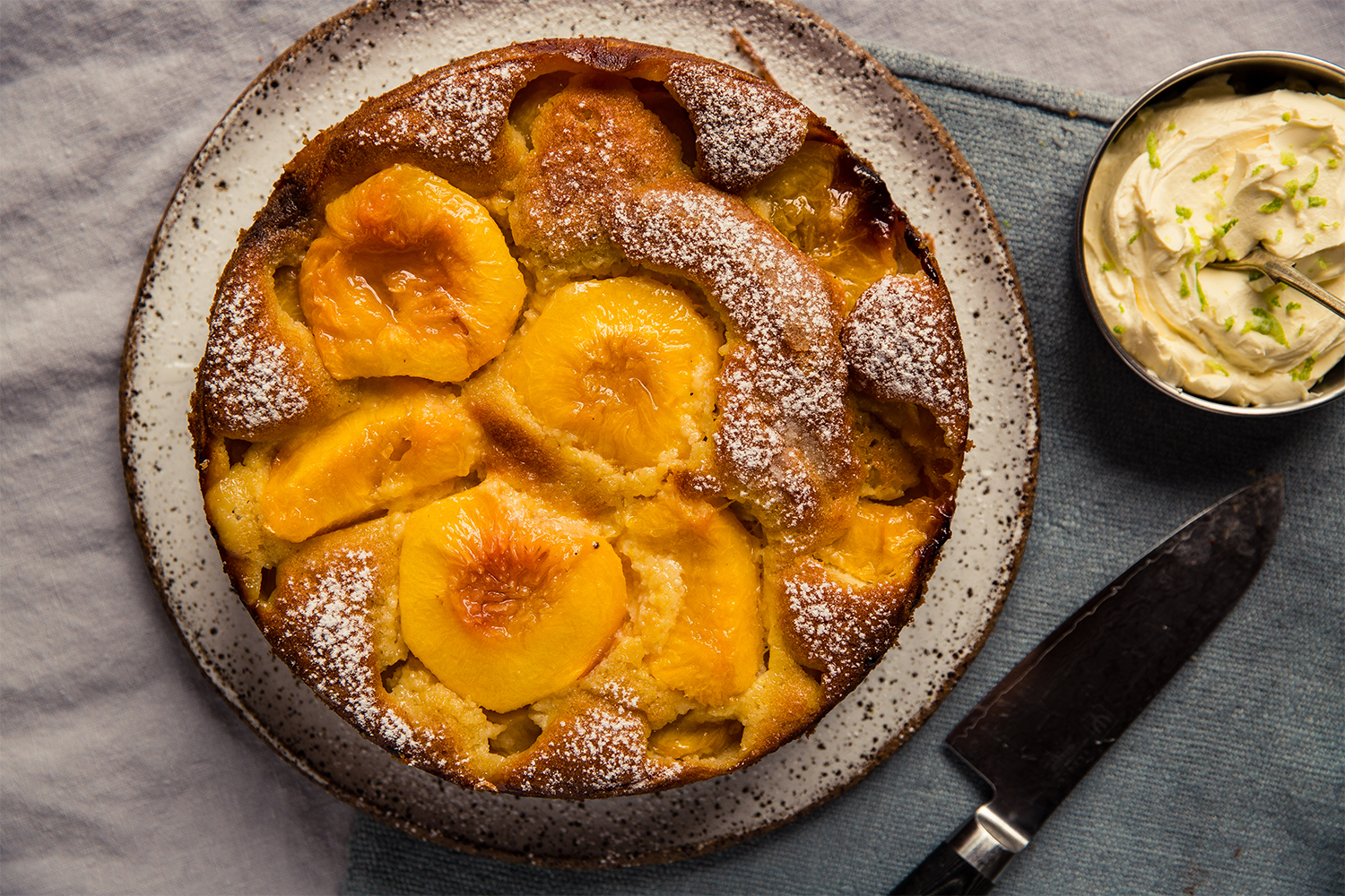 This cake is delicious baked with peaches, plums or feijoas. Photo / Babiche Martens.