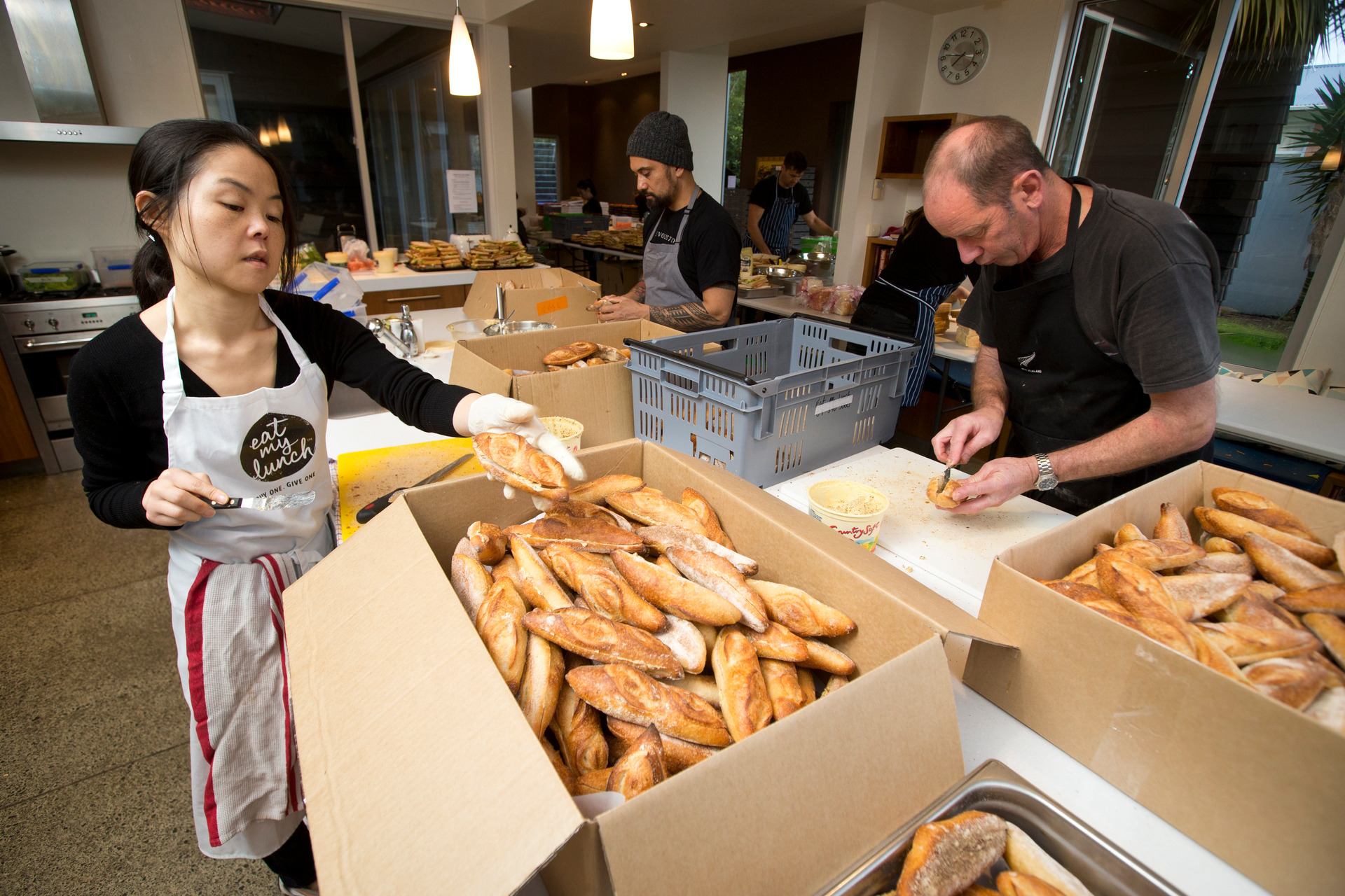 Lisa King, chef Michael Meredith, centre, and Bruce Begg hard at work. Photo / Jason Oxenham
