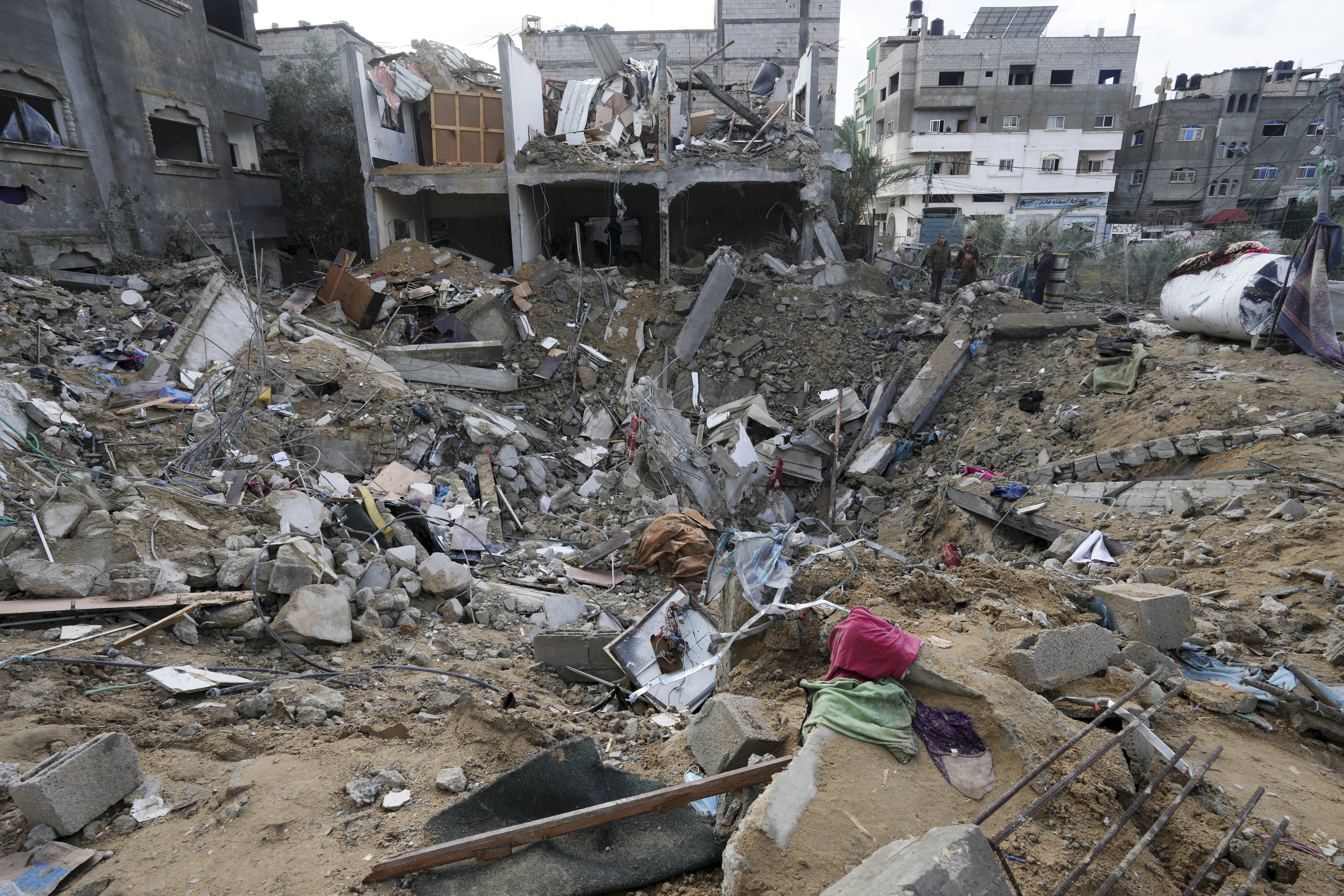 Destruction after an Israeli strike at a residential building in Deir al Balah, Gaza Strip. Photo / AP
