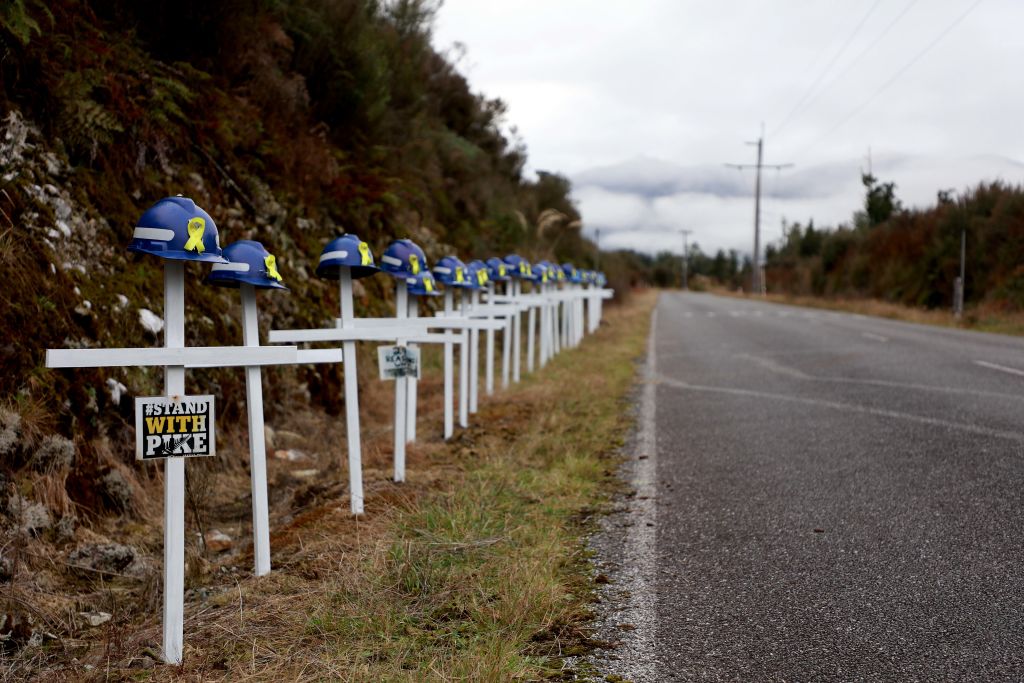 Twenty-nine white crosses on the access road to the Pike River mine, drive home the scale of the disaster and loss of the 29 men killed. Photo / Getty Images