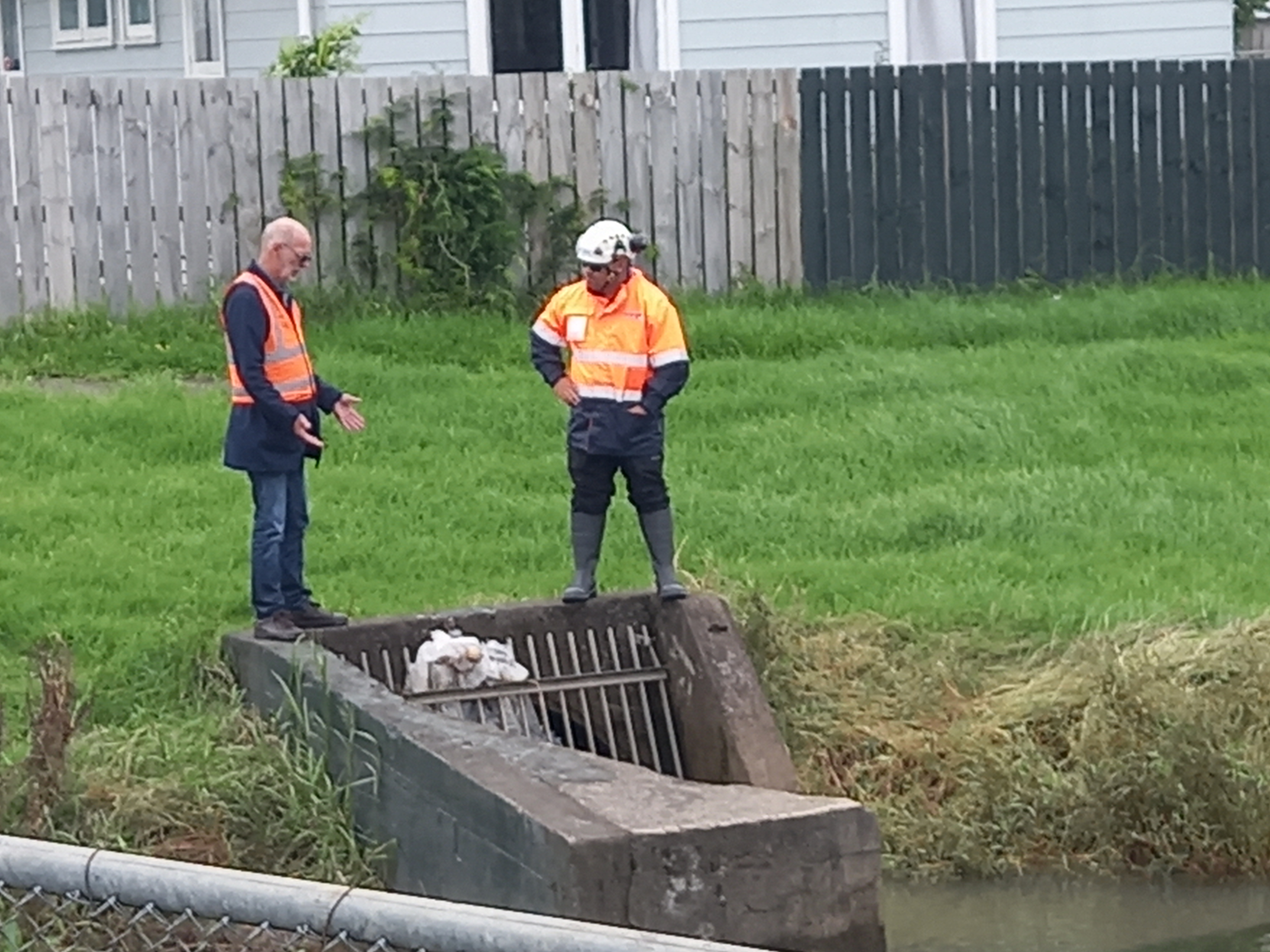 Auckland Mayor Wayne Brown inspects a drain in Māngere after flooding events. Photo / Supplied