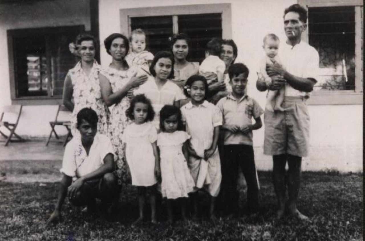 Sir Collin pictured as a baby (held by his mother Vaipipi, second from the left) with family members including his grandparents (also holding babies). Photo / Supplied