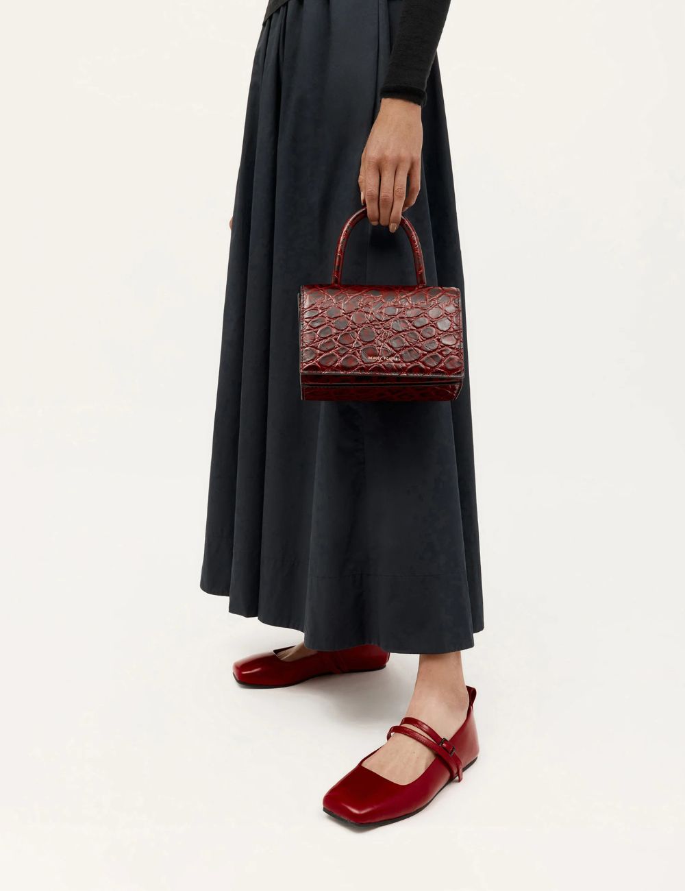 How about a glossy ballet flats that will catch the light just so?