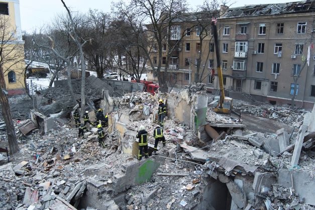 Rescuers work at the scene of an apartment building hit by a Russian rocket in Kramatorsk, Ukraine, on Thursday. Photo / AP