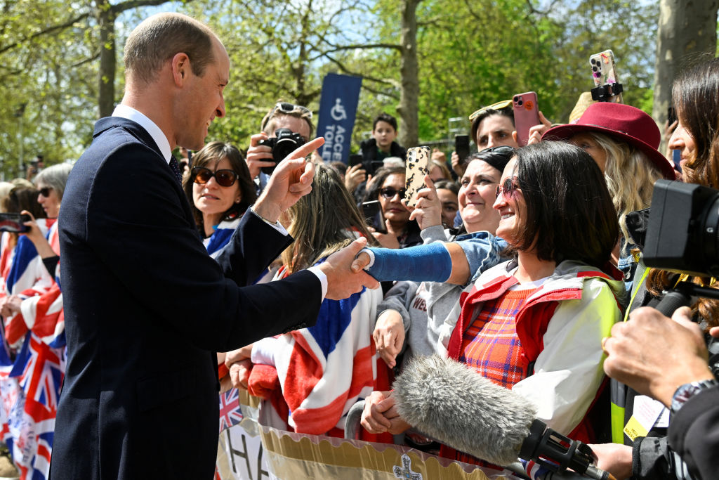 Prince William greets wellwishers during a walkabout on The Mall outside Buckingham Palace ahead of his father's coronation. Photo / Getty