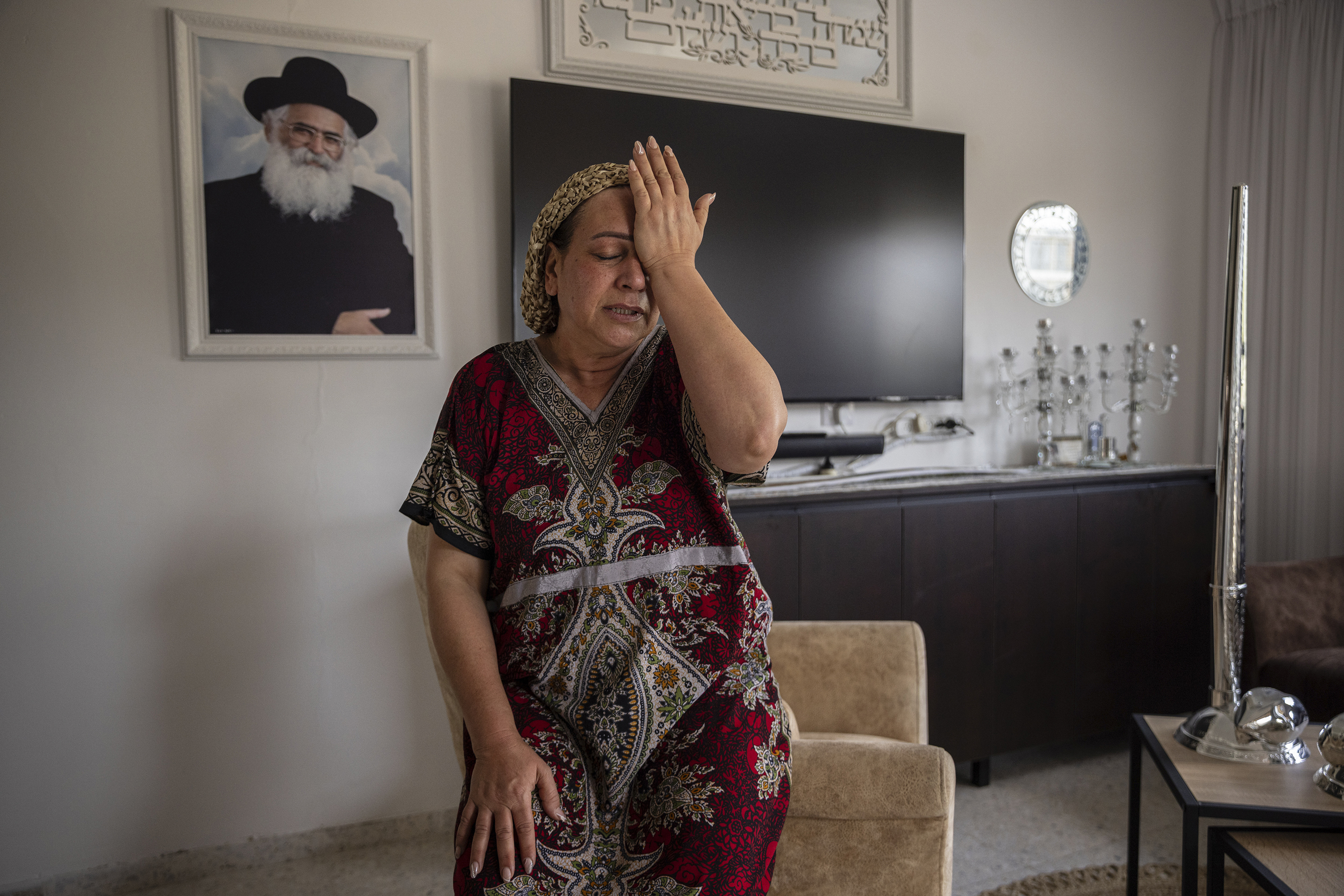 Tali Touito was overwhelmed with emotion at her home in Sderot on Sunday as she described how Hamas gunmen attacked and took over the police station on her street and the gunfight that followed. Photo / Tamir Kalifa, The New York Times