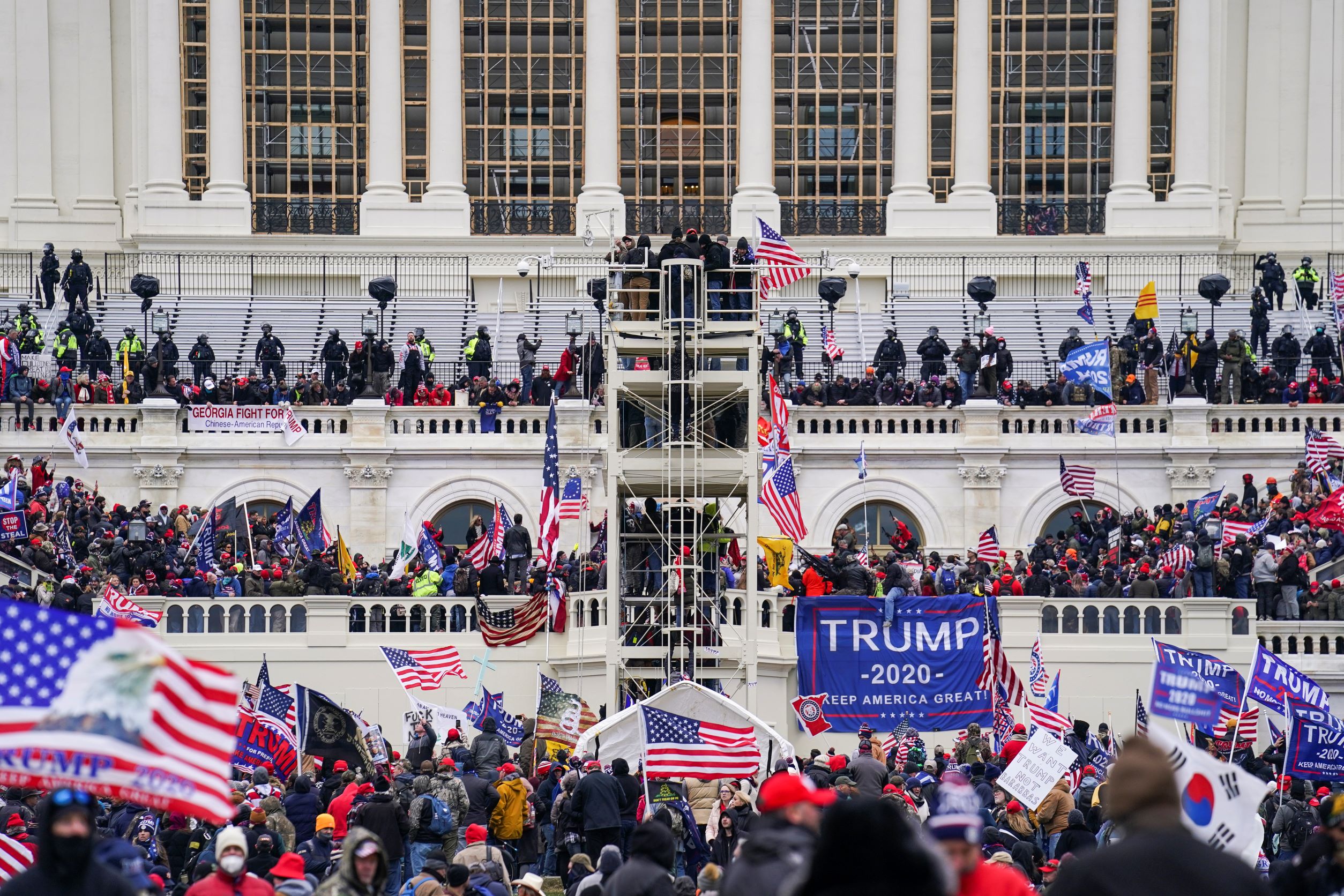 Insurrectionists loyal to President Donald Trump breach the Capitol in Washington, January 6, 2021. (AP Photo/John Minchillo, File)