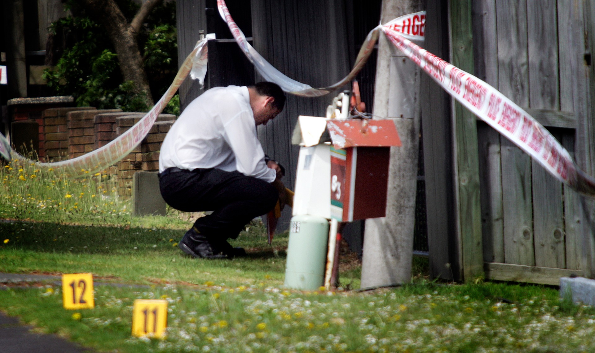 Police at the scene of Daryl Graydon's murder. Photo / Doug Sherring
