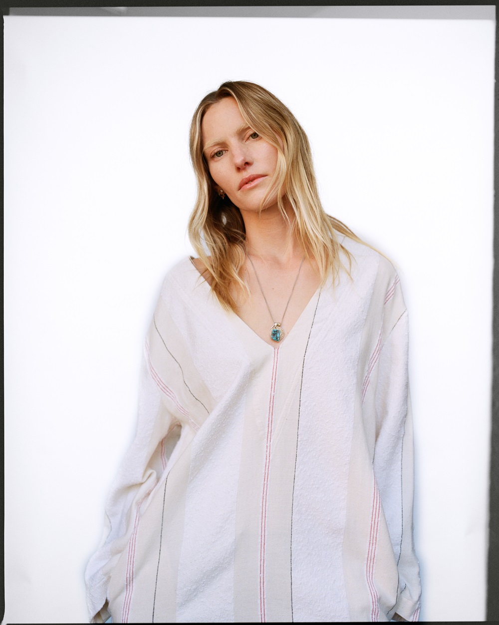 Emily Baker wears Ilio Nema tunic dress, the charm pendant is the stylist's own. Photo / Rob Tennent