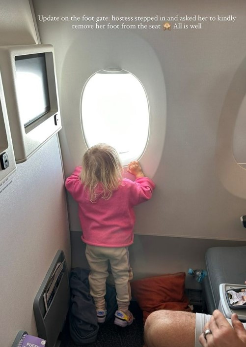 Finally, a hosted stepped in and asked the passenger to remove their foot from the seat. Photo / Instagram