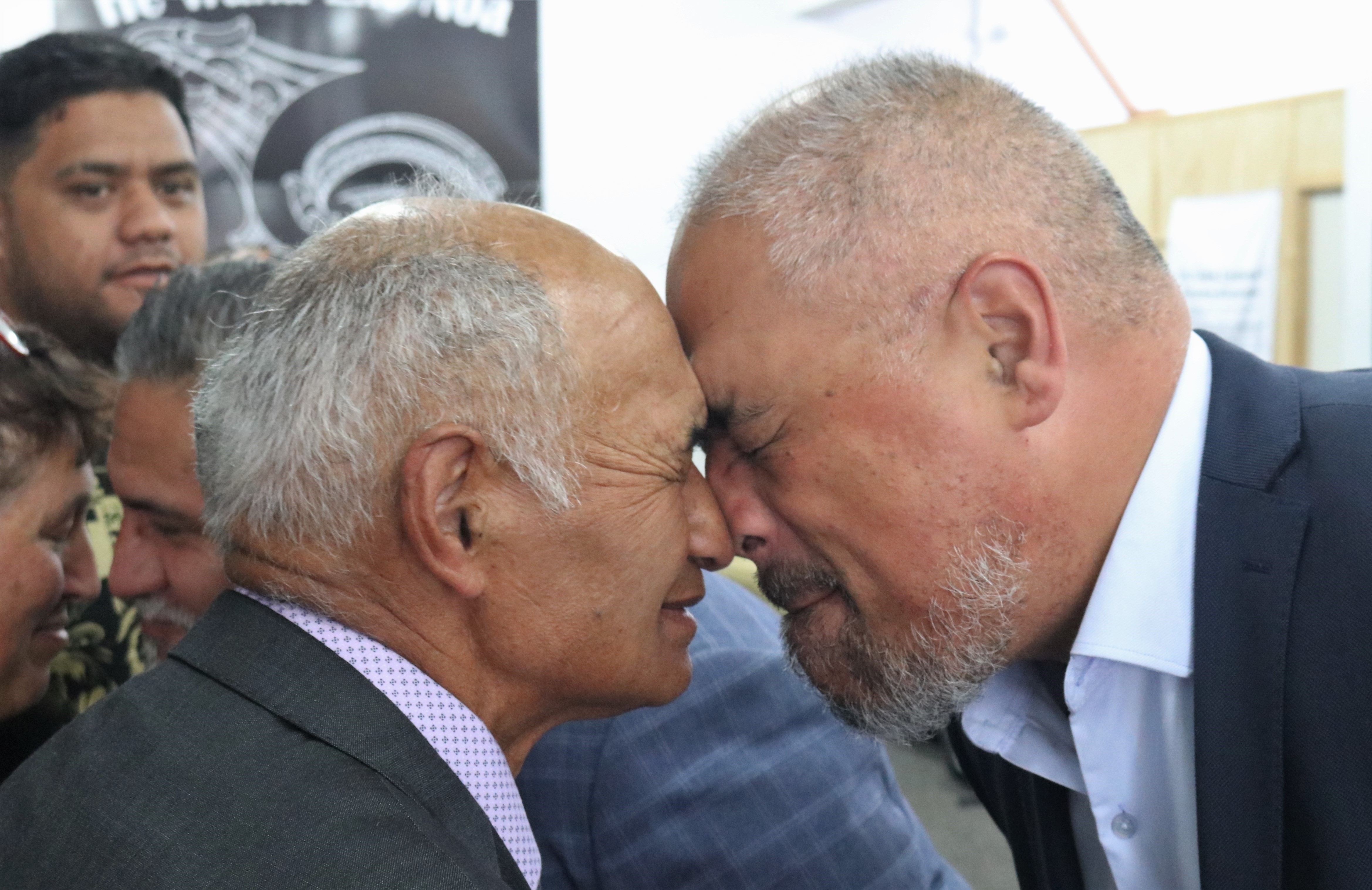 Kaumātua Victory Te Whata shares a hongi with Associate Health Minister Peeni Henare during a visit to Kaikohe’s Whakaoranga Whānau Recovery Hub. Photo / Peter de Graaf