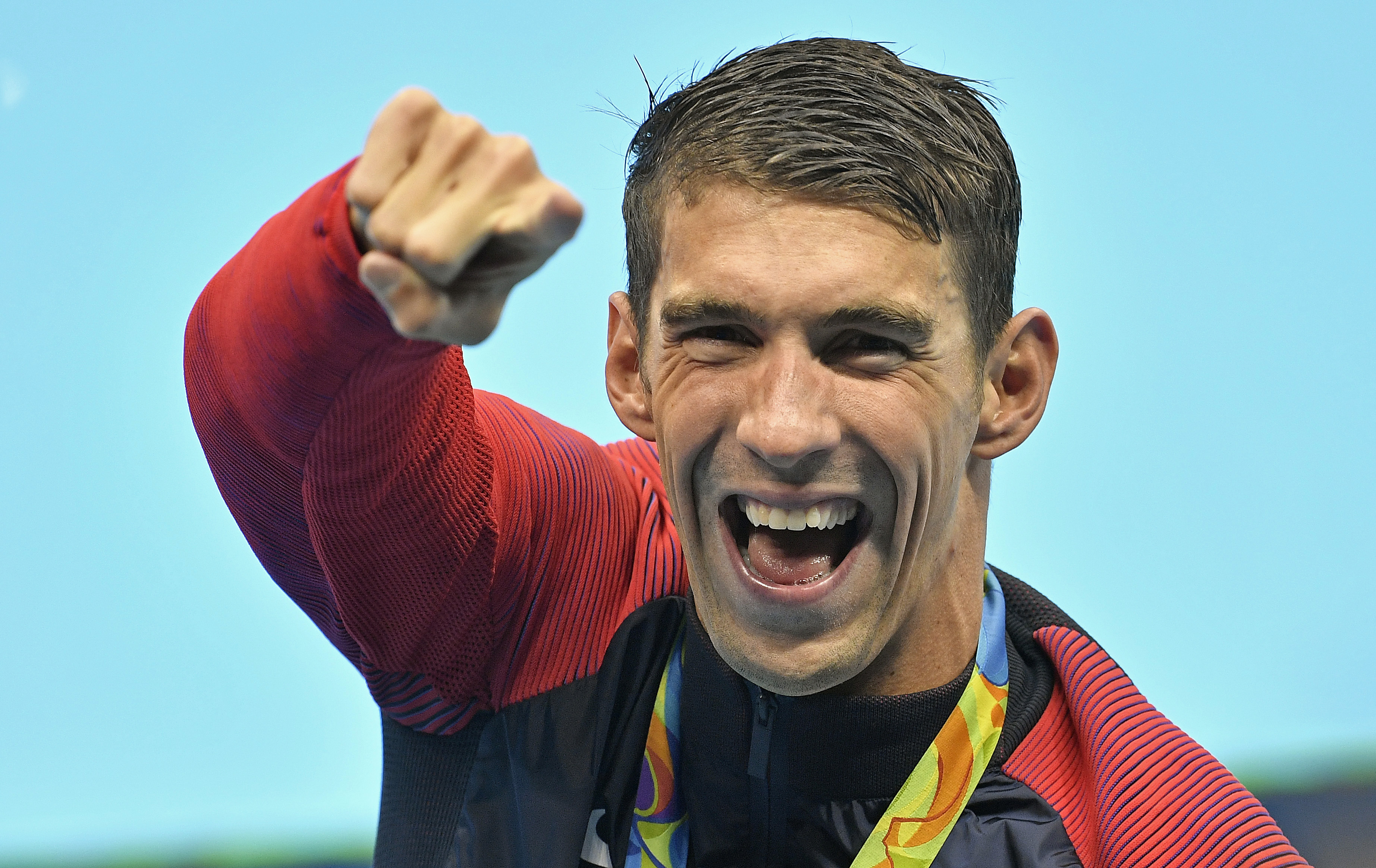 United States' Michael Phelps celebrates after winning the gold medal in the men's 4x100-meter final during the swimming competitions at the 2016 Summer Olympics. Photo / AP.