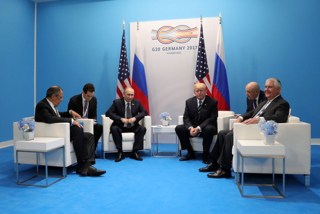 Rex Tillerson, far right, says he was present during the leaders' two-hour meeting in Hamburg but his account differs from that of the interpreter who was there. Photo / Getty 