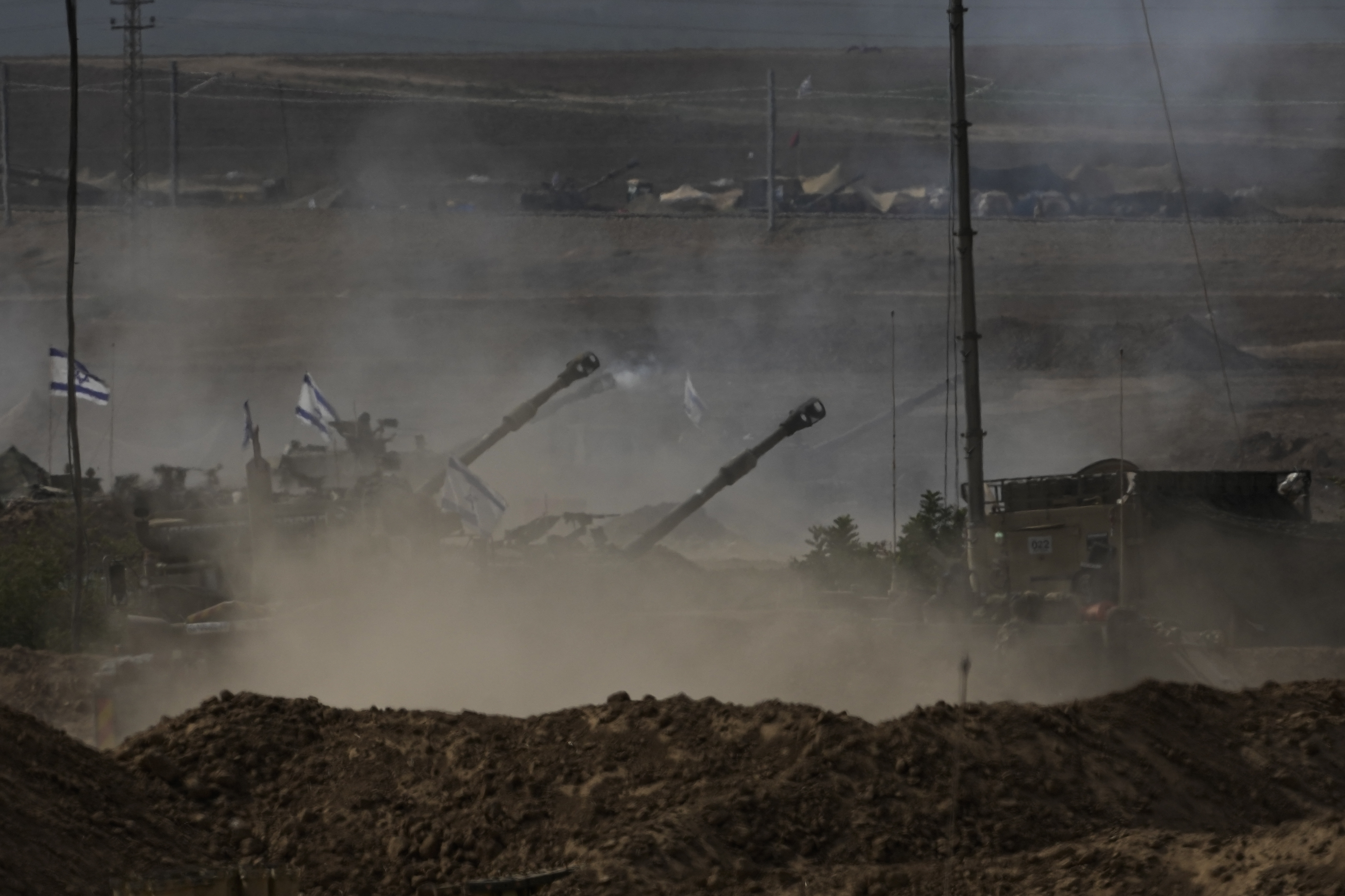 Israeli artillery fires near the border with Gaza. Photo / AP