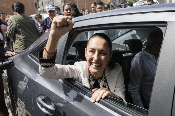 Ruling party presidential candidate Claudia Sheinbaum leaves the polling station on Sunday.  Photo / AP
