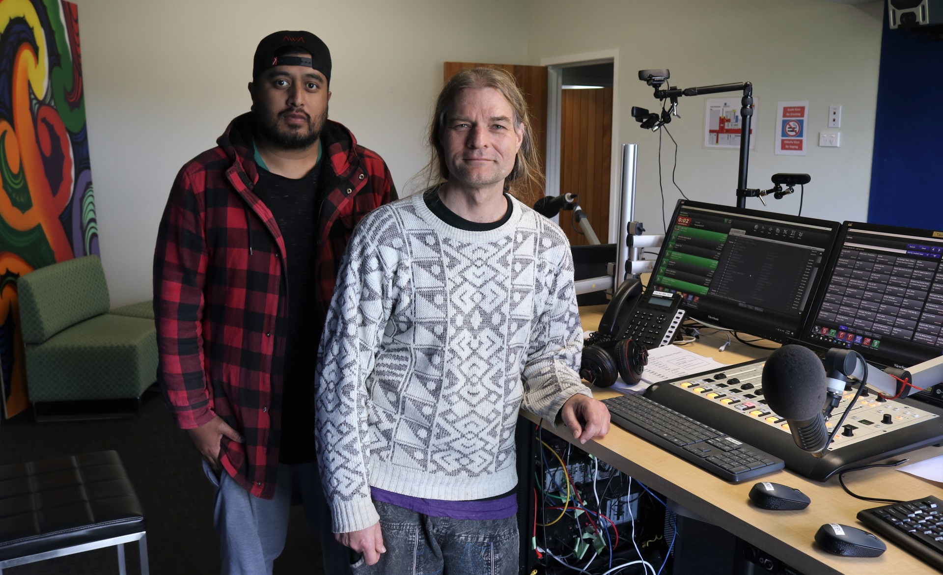 Tautoko FM technicians Shanye Barber, left, and Nityesh Schnaderbeck. Photo / Peter de Graaf 
