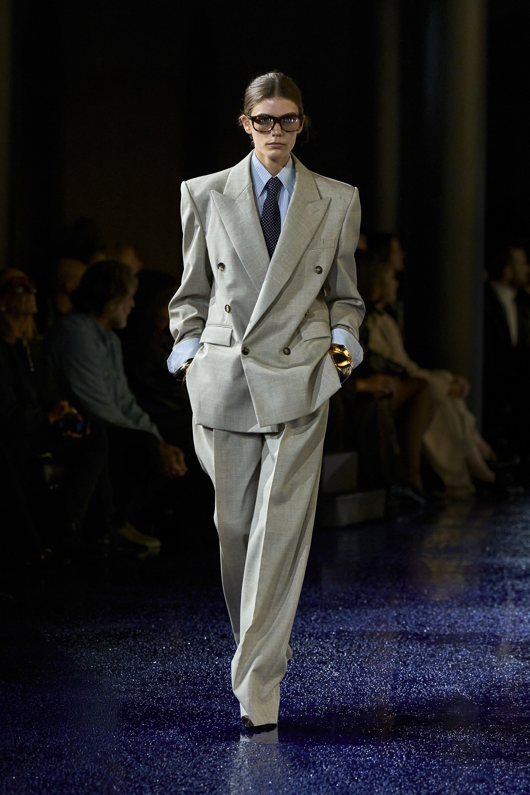 Glasses, tailored suiting and outsized proportions were pure Yves.