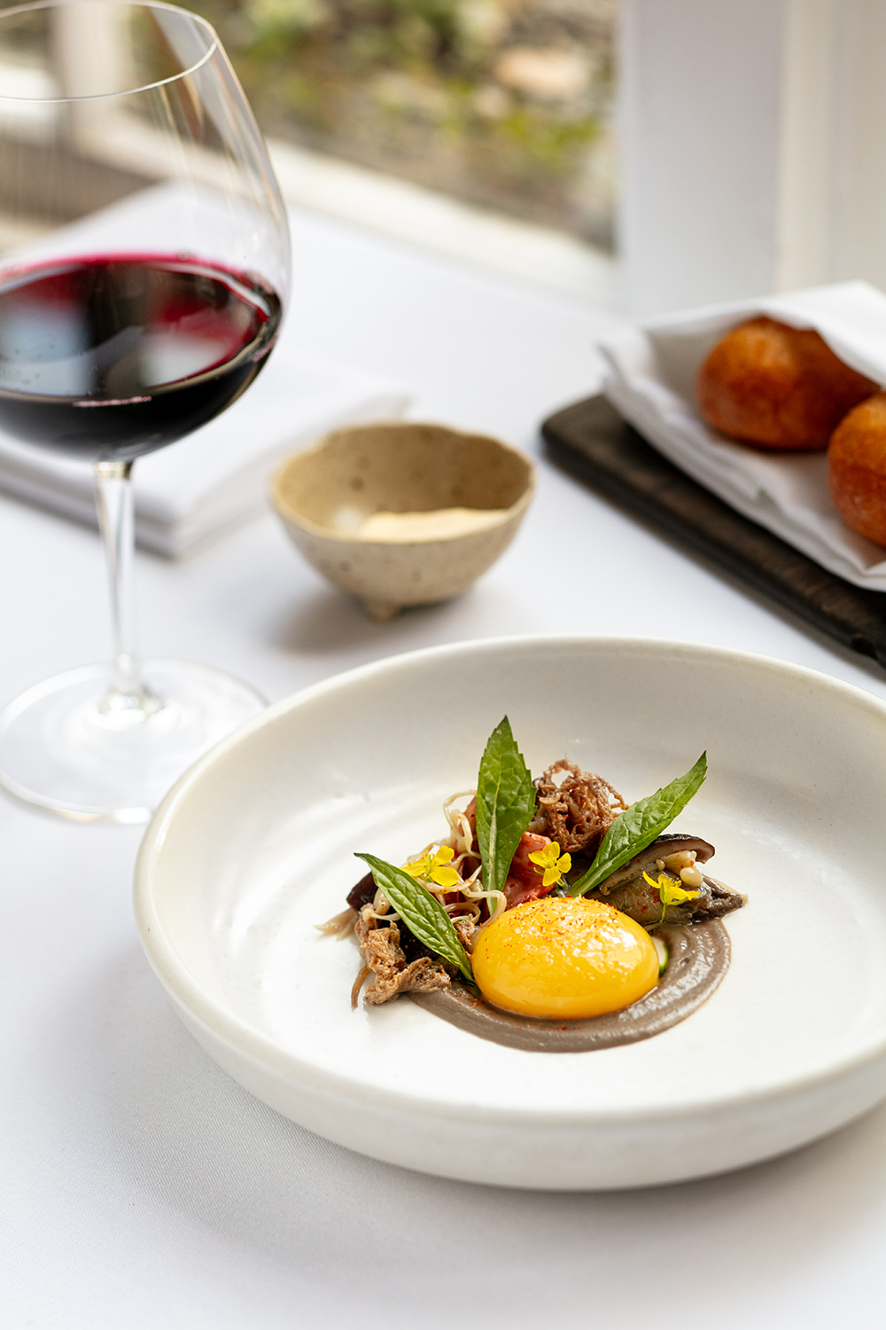 The mushrooms with duck yolk from the menu at The Grove restaurant in Auckland. Photo / Babiche Martens