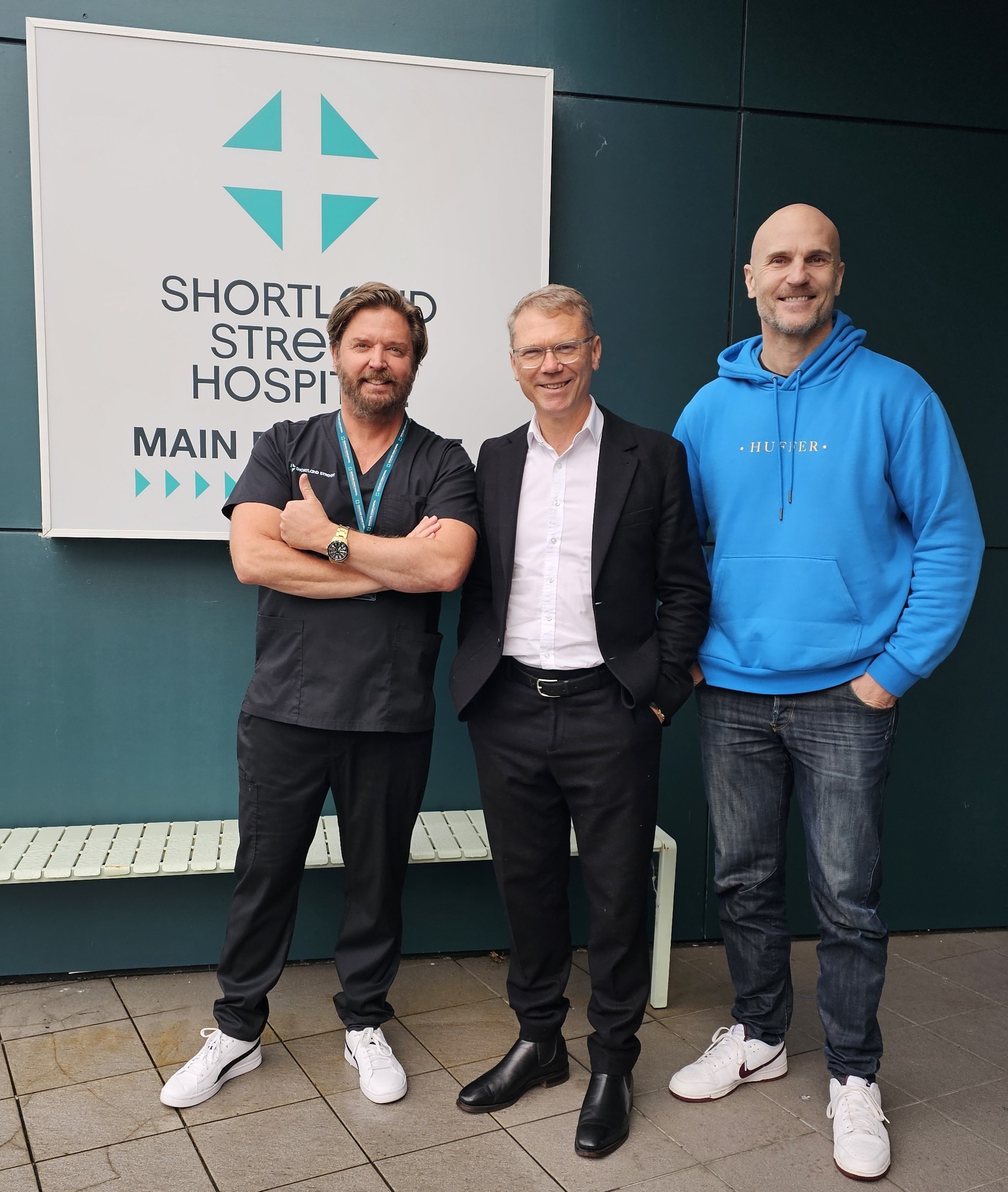 Media and Communications Minister Paul Goldsmith (centre) with Shortland Street cast members Michael Galvin (left) and Ben Barrington.