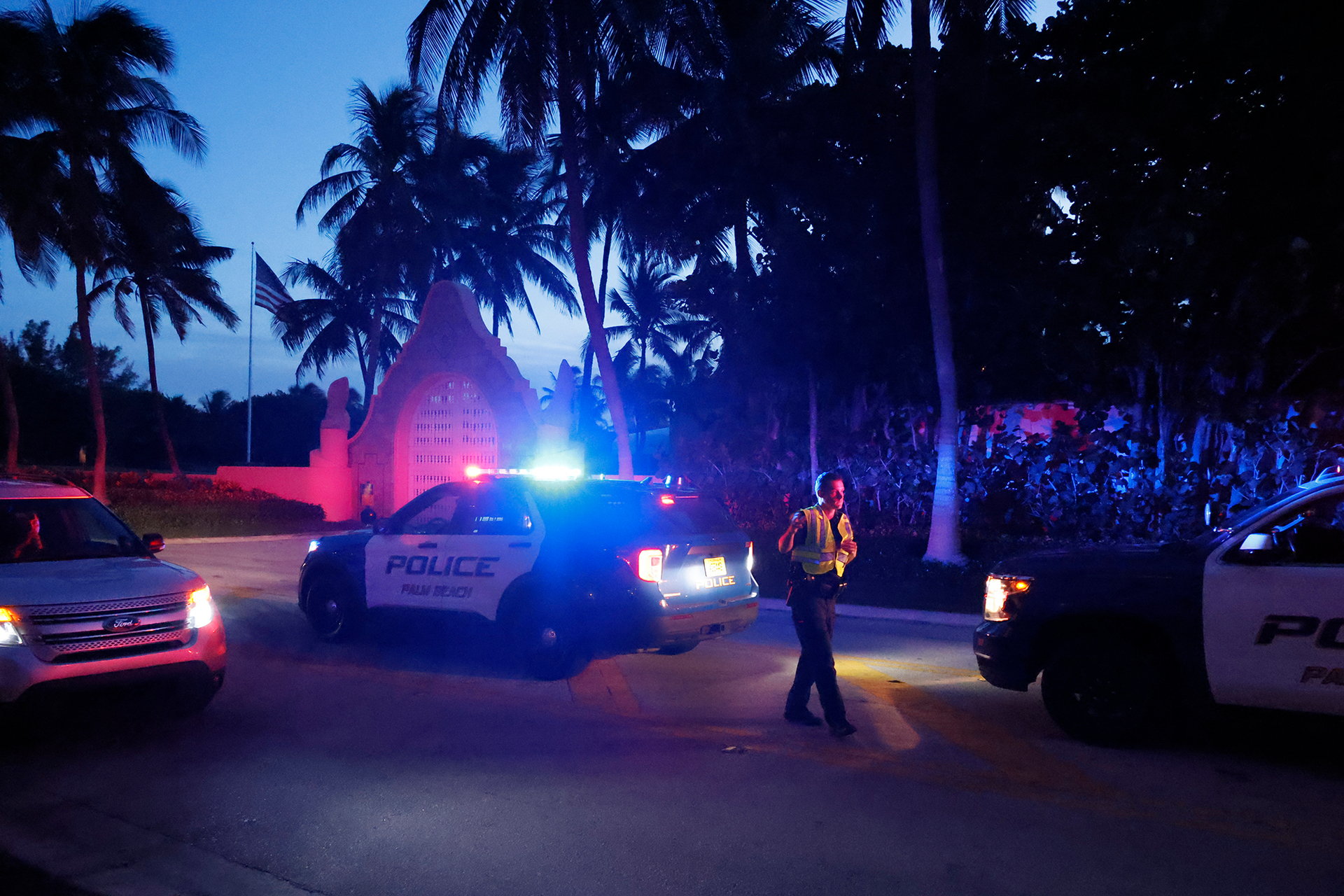 Police direct traffic outside an entrance to former US President Donald Trump's Mar-a-Lago estate. Photo / AP
