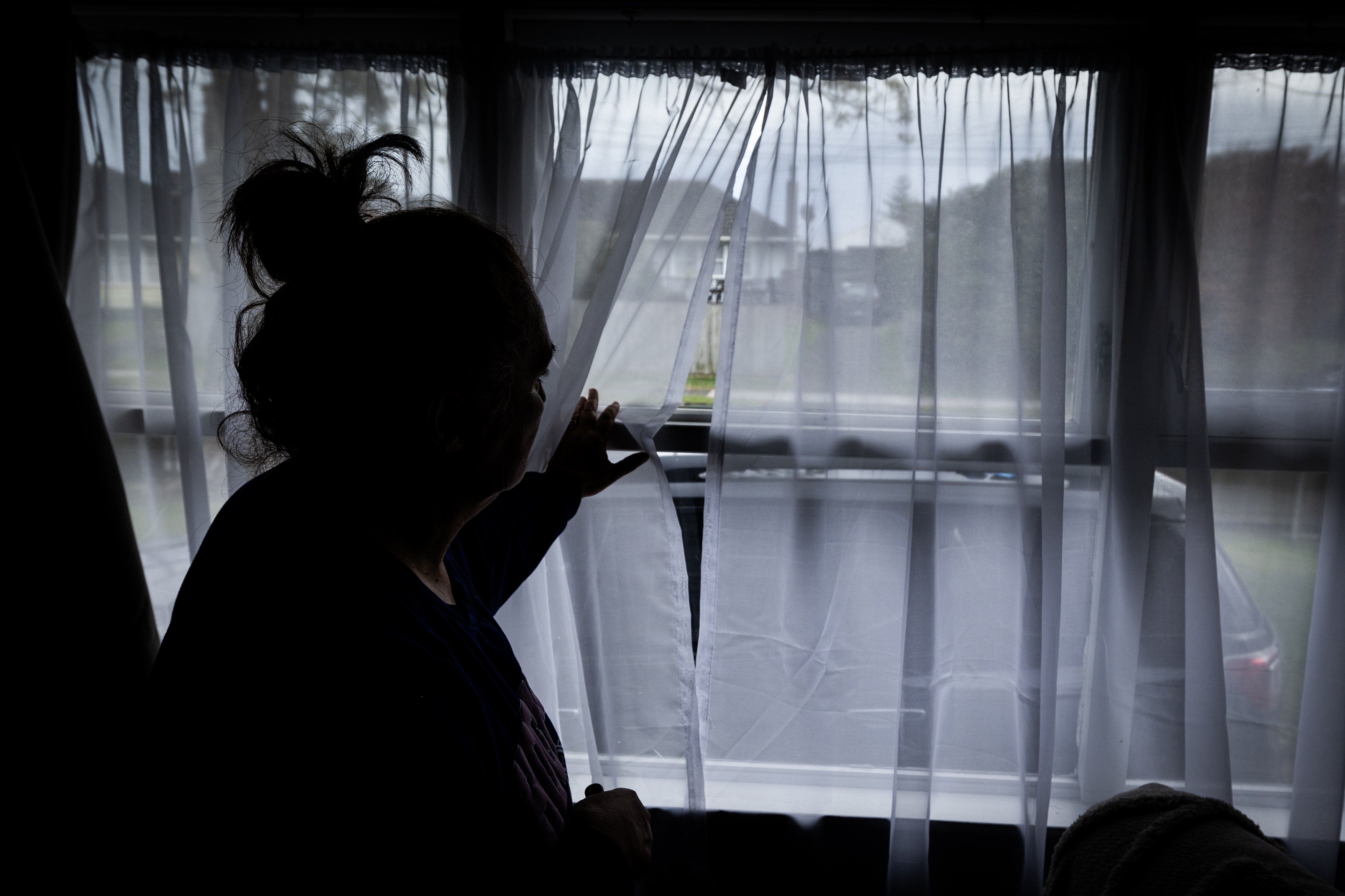The tenant in her house after it was targeted in a drive-by shooting in Māngere East. Photo / Jason Oxenham