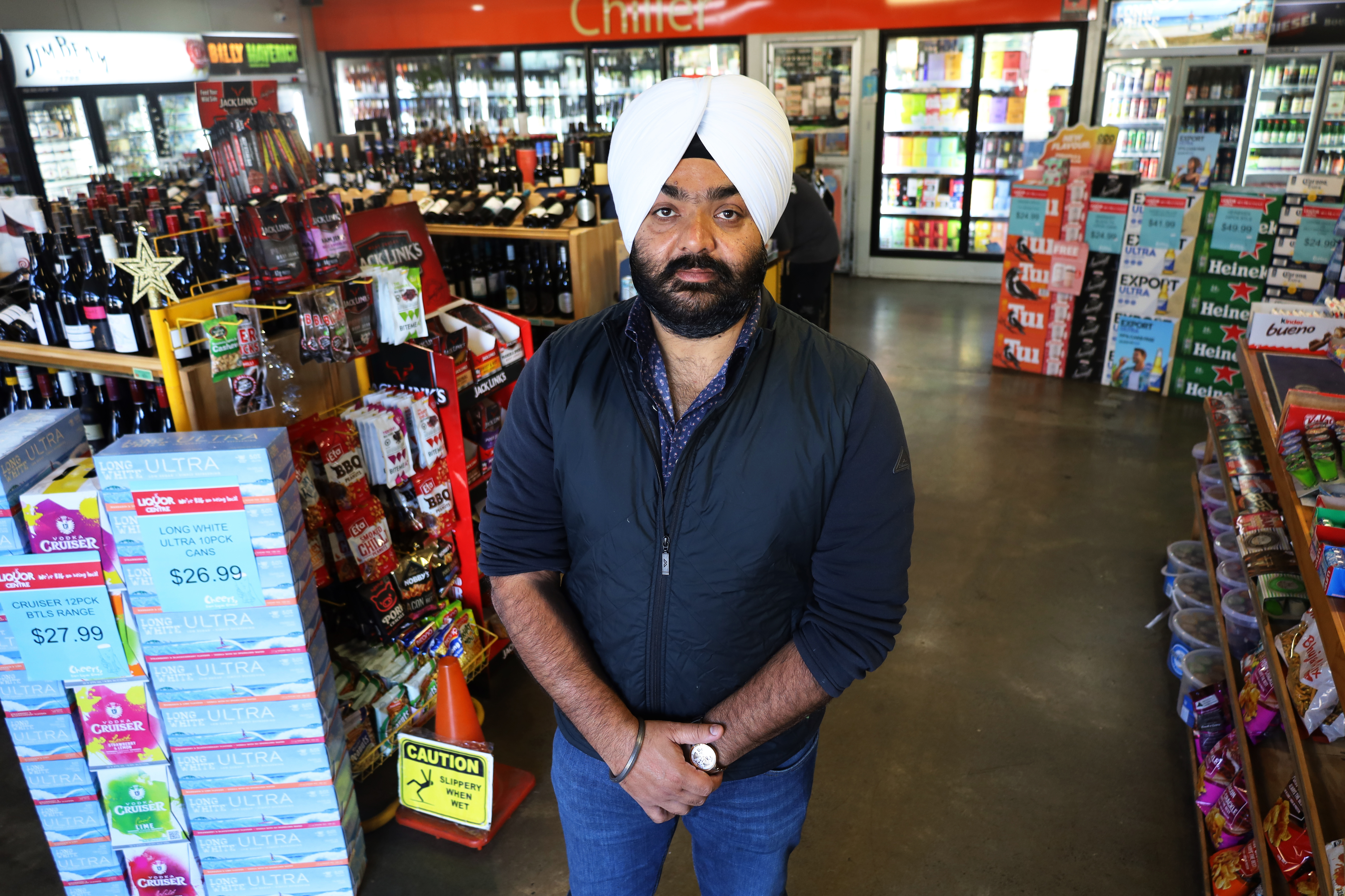 Ravinder Singh, whose Counties Inn Liquor Centre has been hit by thieves 15 times, despite a raft of security measures. Photo / Jed Bradley