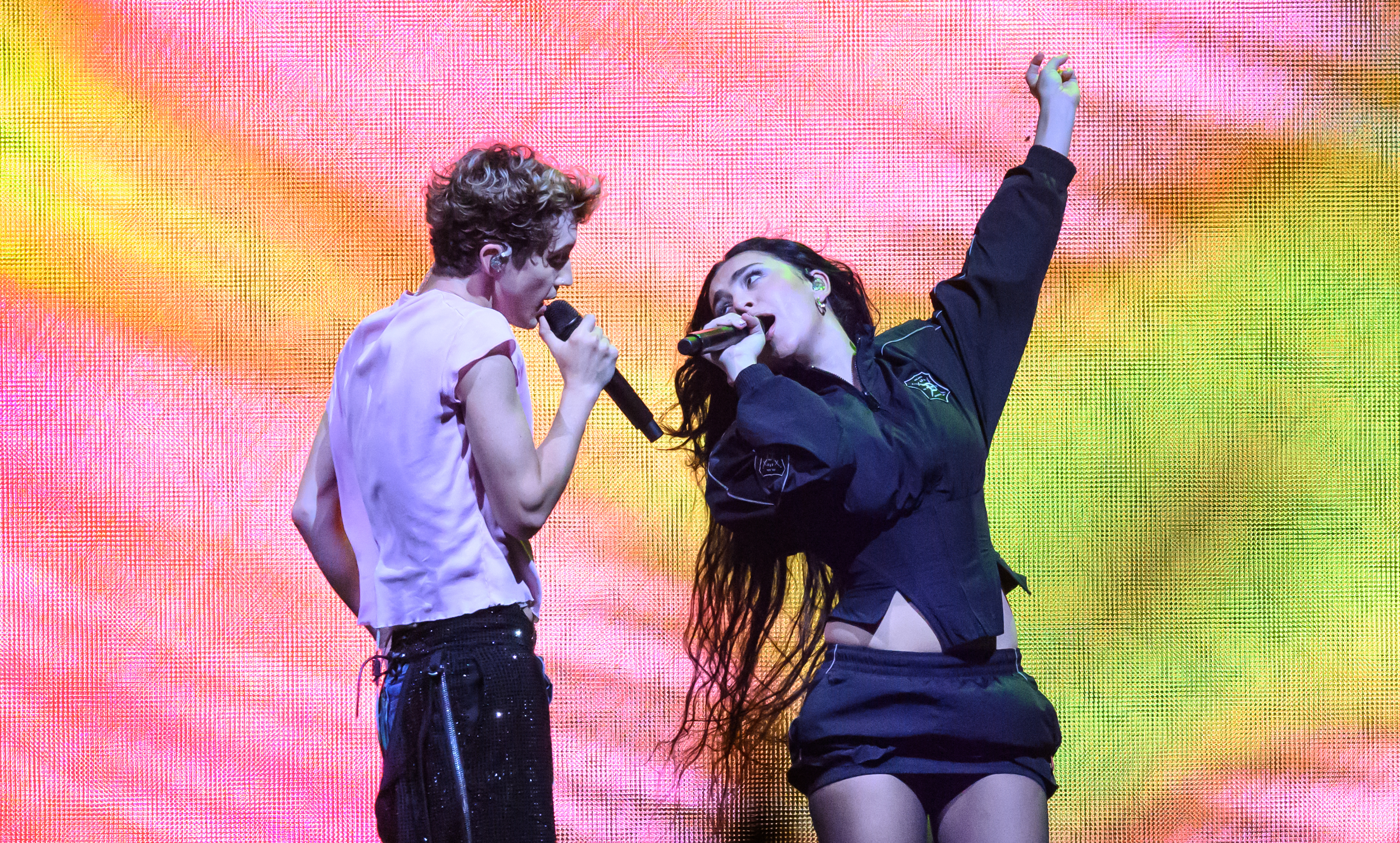 Charli XCX joins Troye Sivan on stage during the Something to Give Each Other Tour at OVO Arena Wembley on June 27. Photo / Getty Images