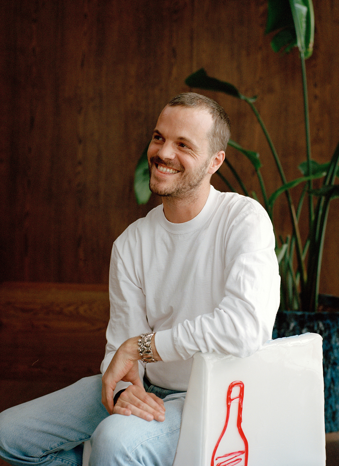 Matthieu Blazy, the creative director of Bottega Veneta, sits in a chair by Gaetano Pesce from his spring 2023 show, at his office in Milan. There was a unique chair for each of the show’s guests, reflecting Blazy’s belief in the allure of the individual. Photo / Carmine Romano, The New York Times