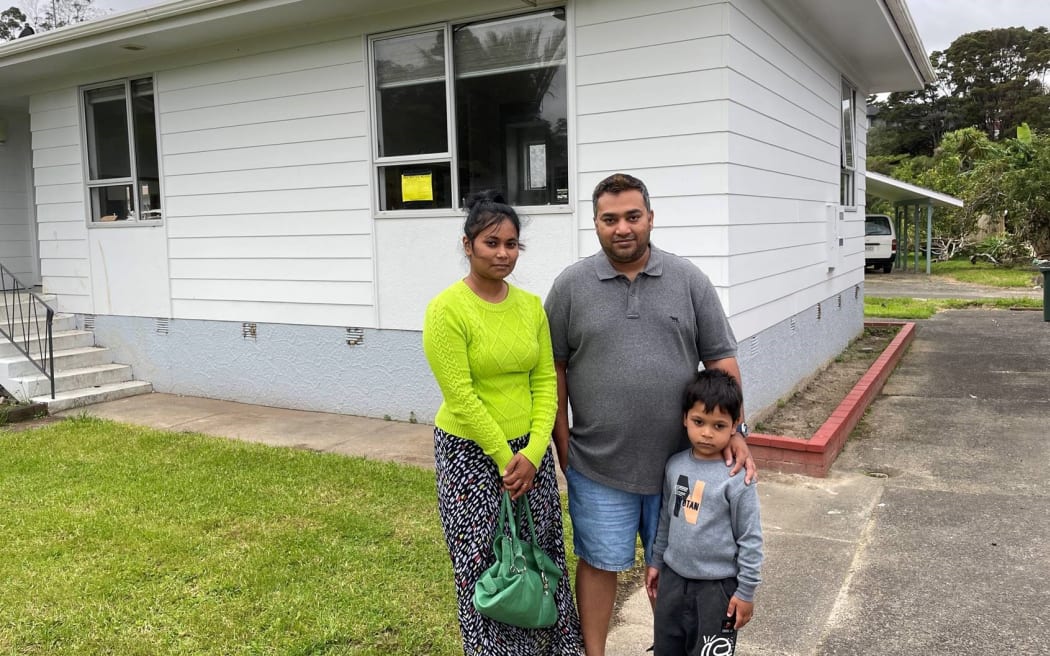 Camphora Place residents Razib Hussain (centre) with his wife Nusrat Jahan and son Rifayat. Photo / RNZ