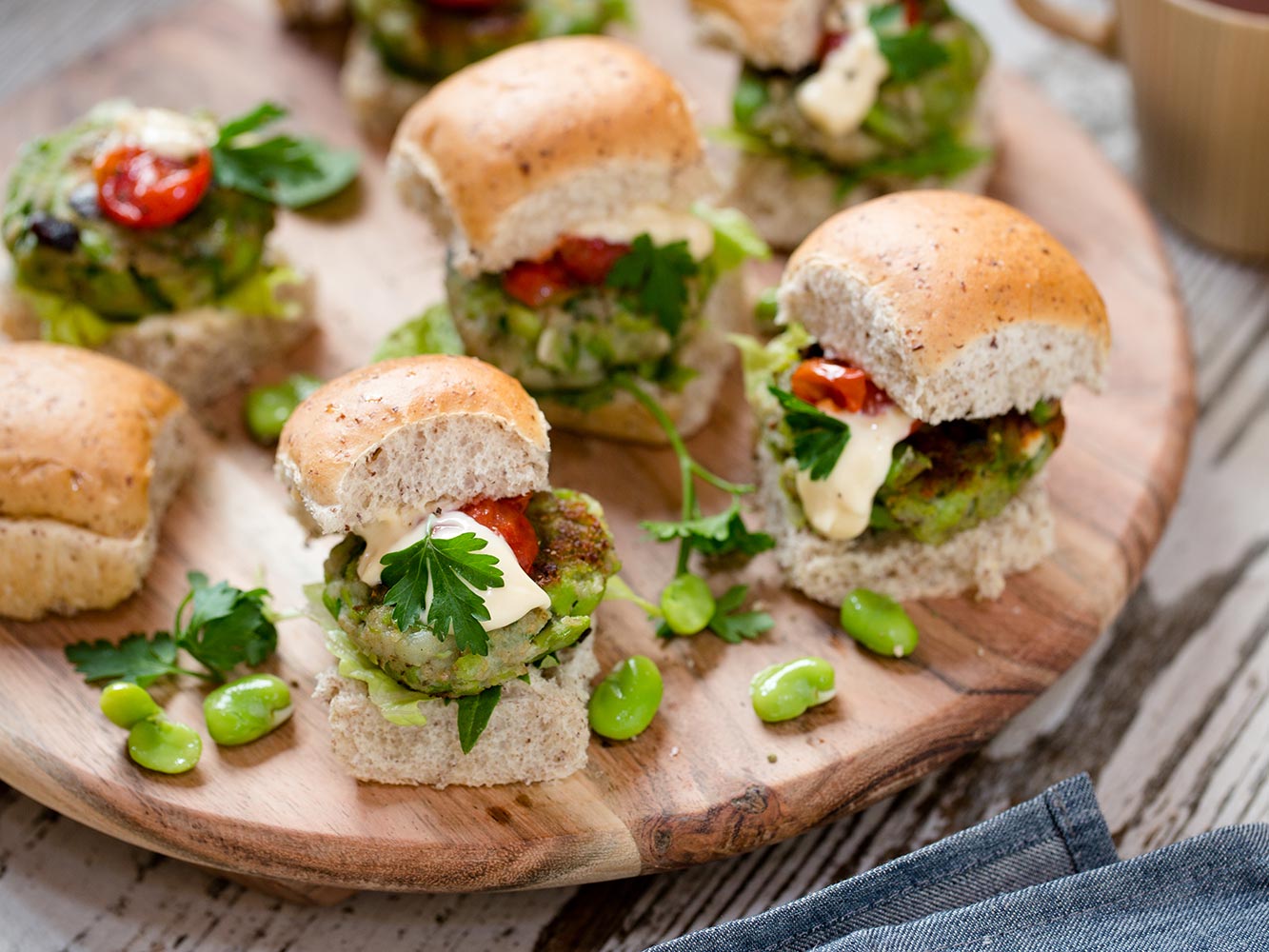 Make your first course a bite-sized broad bean slider. Photo / Babiche Martens