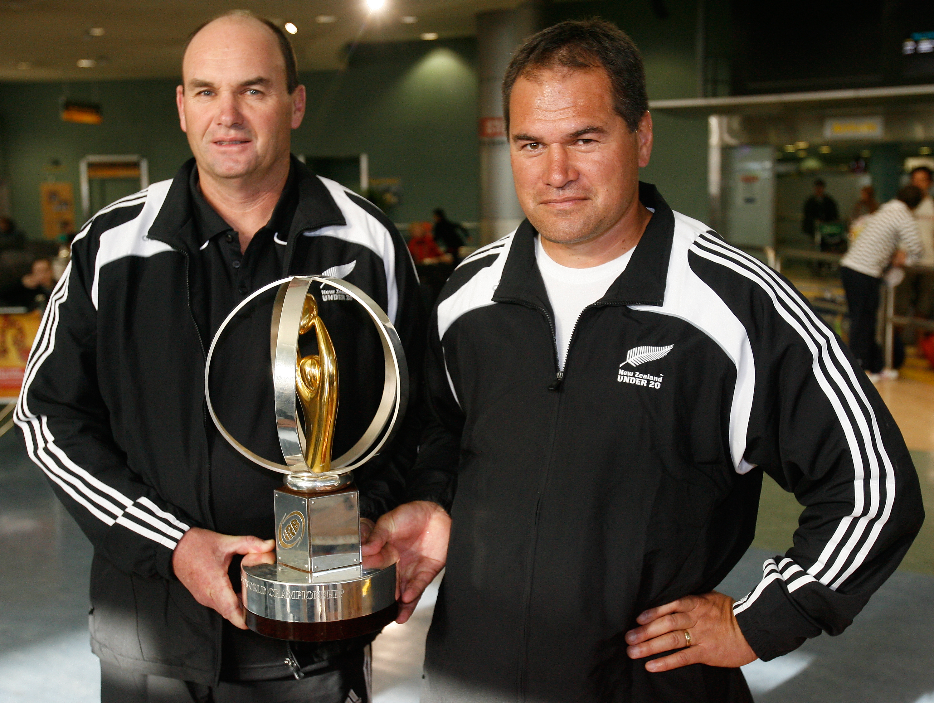 Russell Hilton-Jones (left) and Dave Rennie with the Under-20 World Cup after the team arrived home in 2008. Photo / Greg Bowker