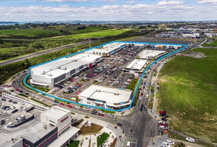 Westgate Lifestyle Centre outlined in blue when it was marketed by Colliers. Costco is shown to the lower left. One the right where the grass is shown is now the site of the new five-building development including Kmart. Photo / Colliers