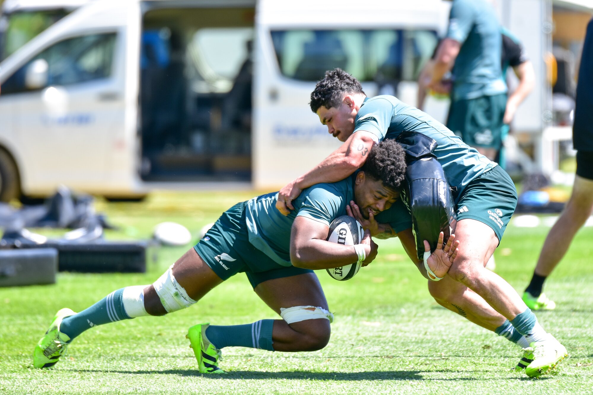 Peter Lakai (with ball) and Du'Plessis Kirifi at All Blacks training in Perth. Photo / Brad Roberts
