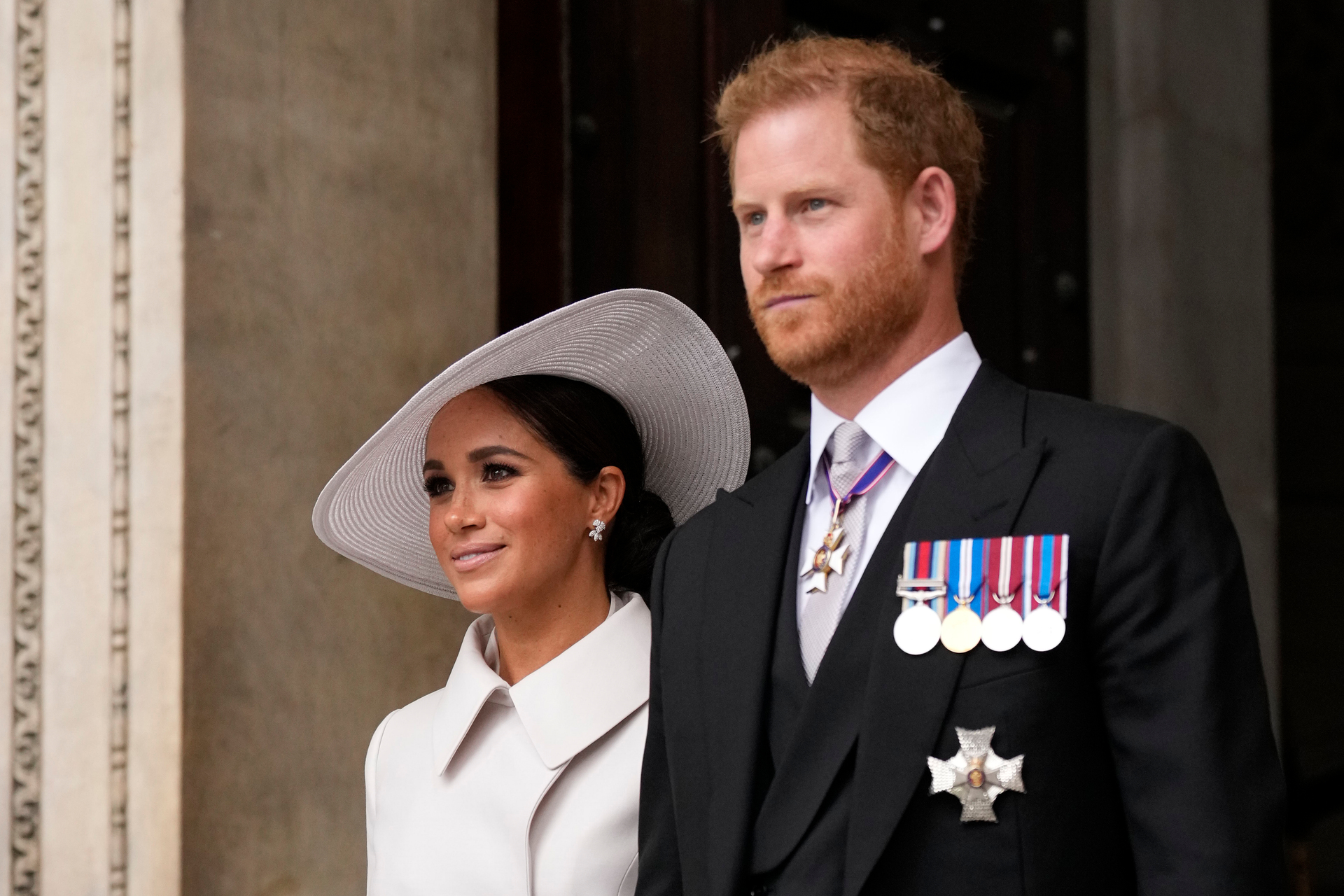 Prince Harry and Meghan Markle, Duke and Duchess of Sussex leave after a service of thanksgiving for the reign of Queen Elizabeth II at St Paul's Cathedral in London. Photo / AP
