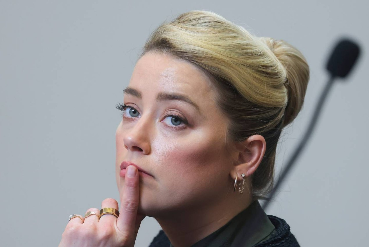 Amber Heard listens in the courtroom in the Fairfax County Circuit Courthouse. Photo / AP