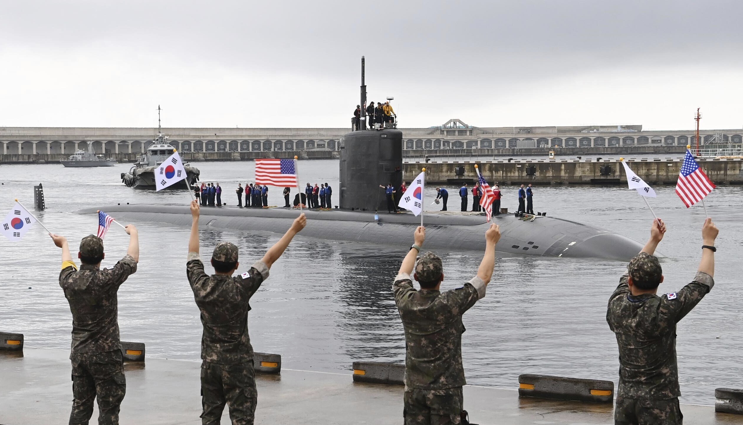 South Korean navy sailors wave as the USS nuclear-powered submarine USS Annapolis arrives at a South Korean naval base on Jeju Island. Photo / South Korea Defense Ministry via AP